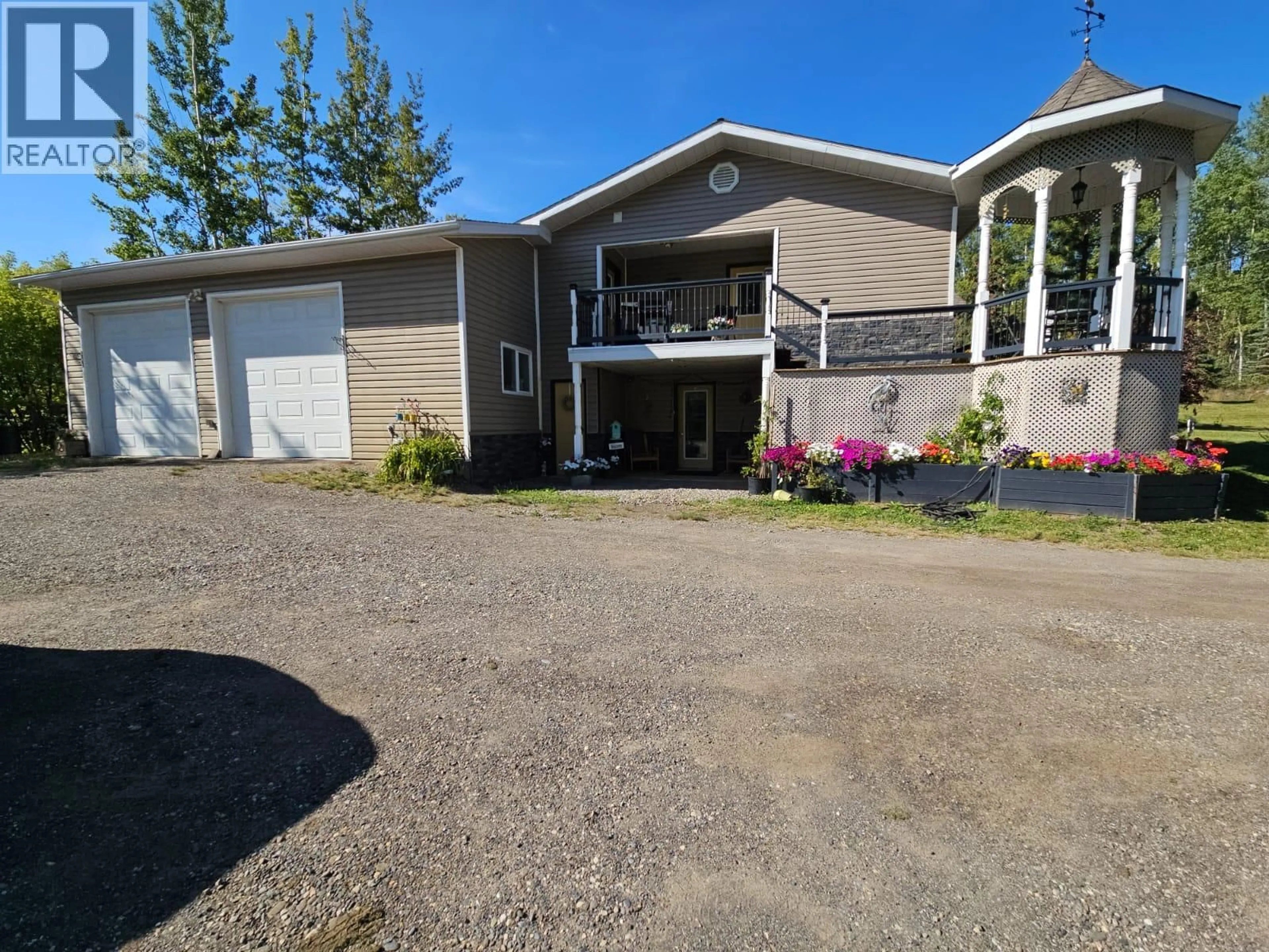 A pic from outside/outdoor area/front of a property/back of a property/a pic from drone, unknown for 5933 KURJATA ROAD, Chetwynd British Columbia V0C1J0