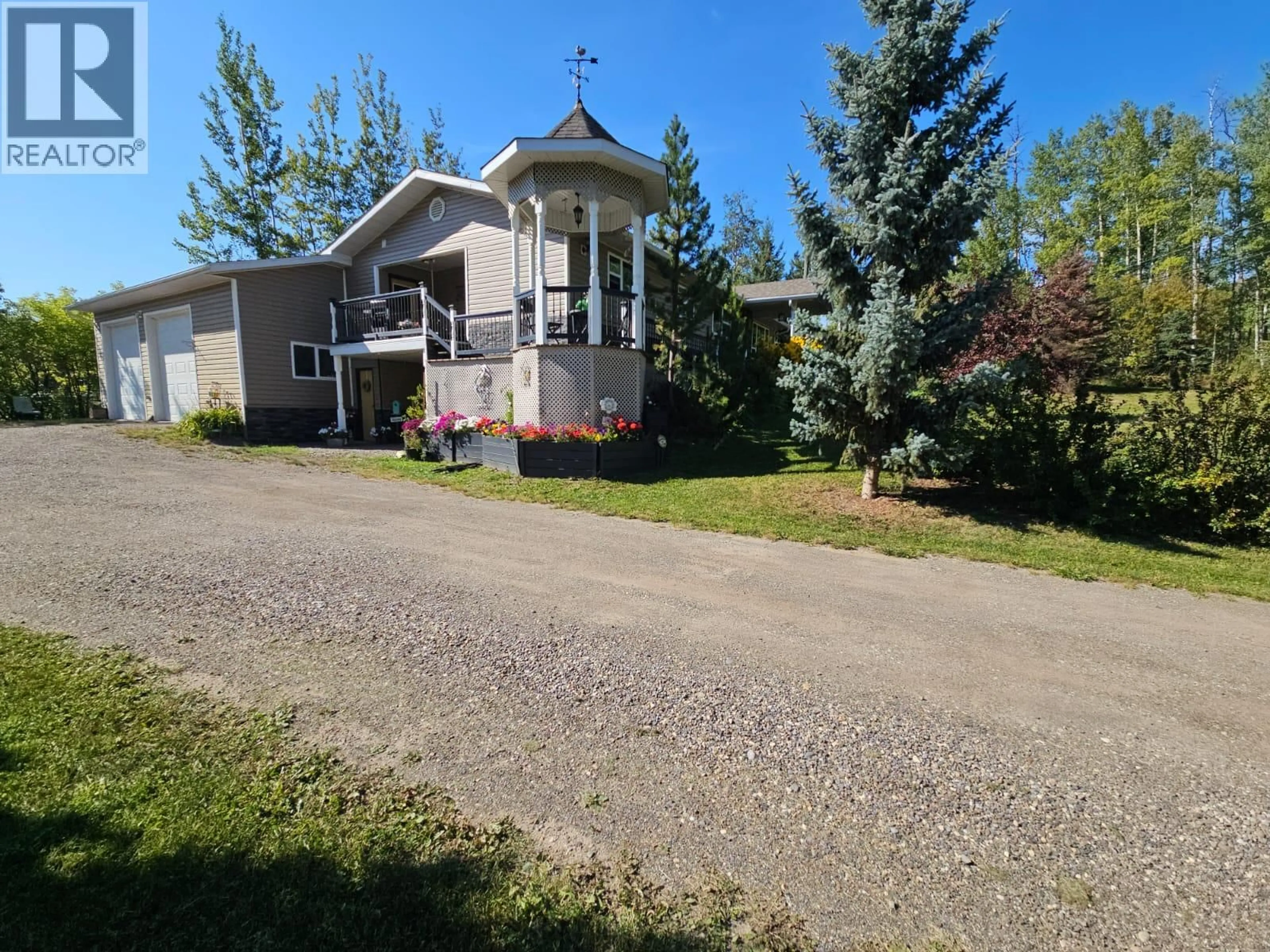 A pic from outside/outdoor area/front of a property/back of a property/a pic from drone, street for 5933 KURJATA ROAD, Chetwynd British Columbia V0C1J0