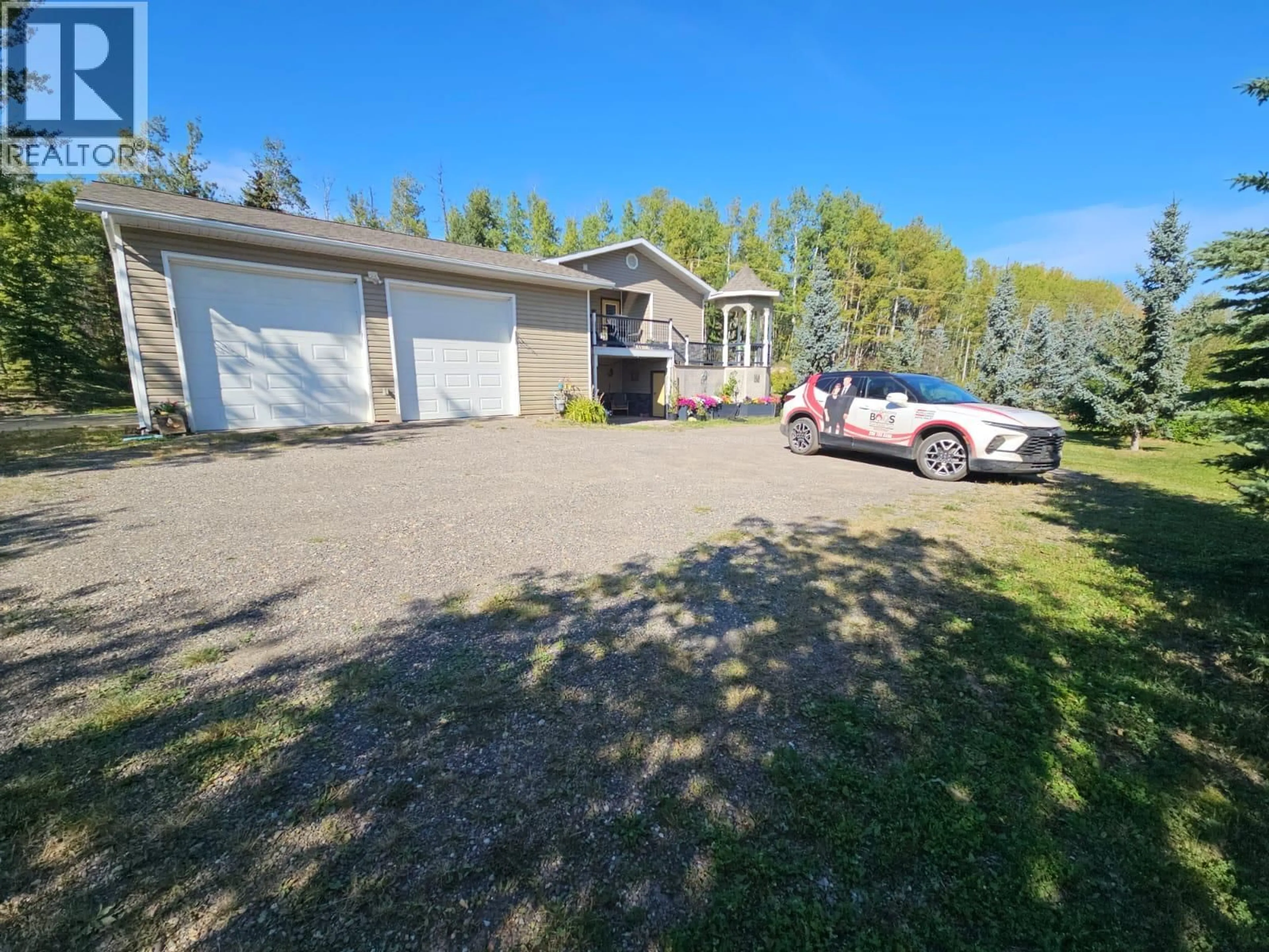 A pic from outside/outdoor area/front of a property/back of a property/a pic from drone, street for 5933 KURJATA ROAD, Chetwynd British Columbia V0C1J0