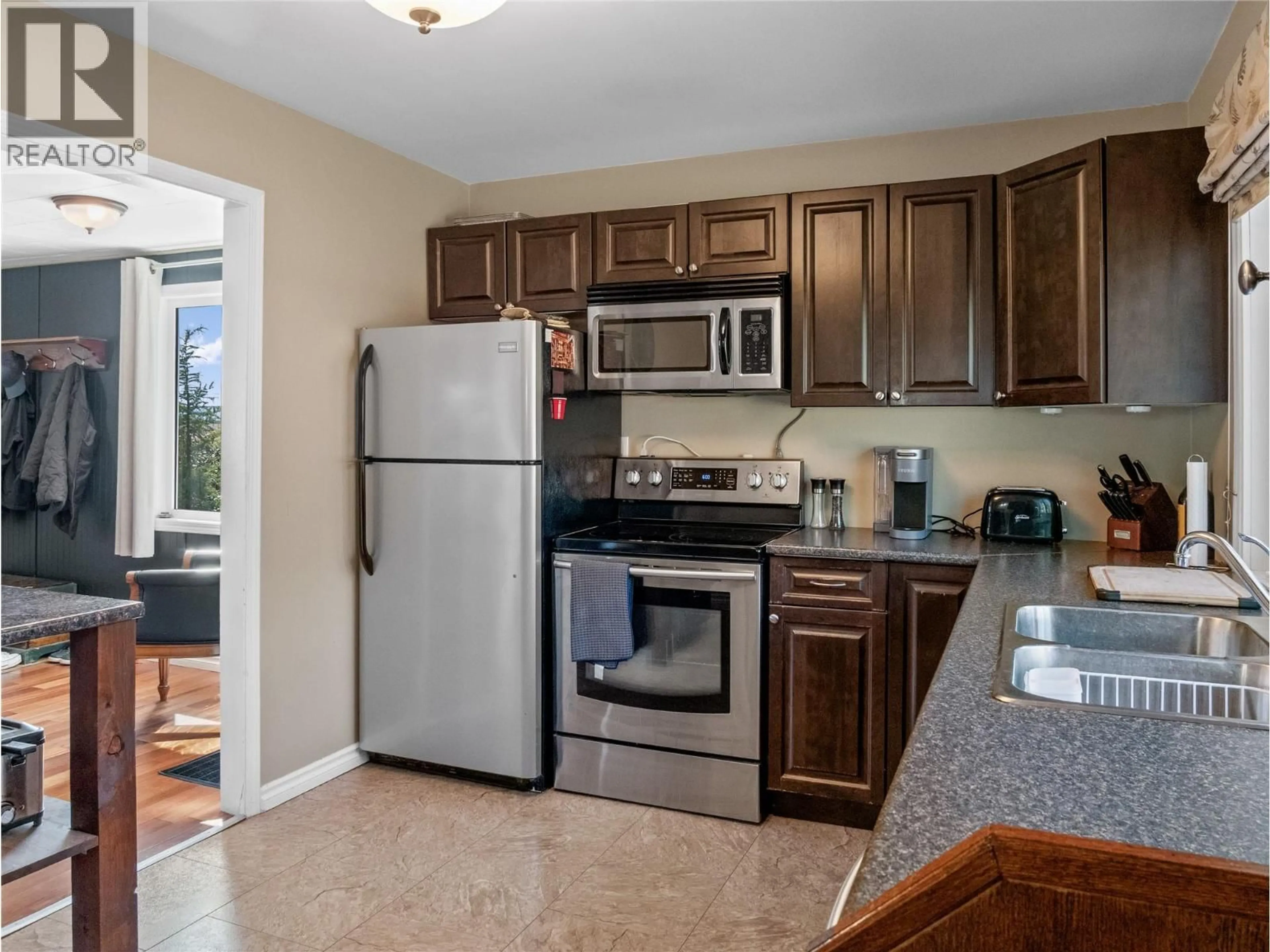 Standard kitchen, ceramic/tile floor for 1812 91 AVENUE, Dawson Creek British Columbia V1G1B1