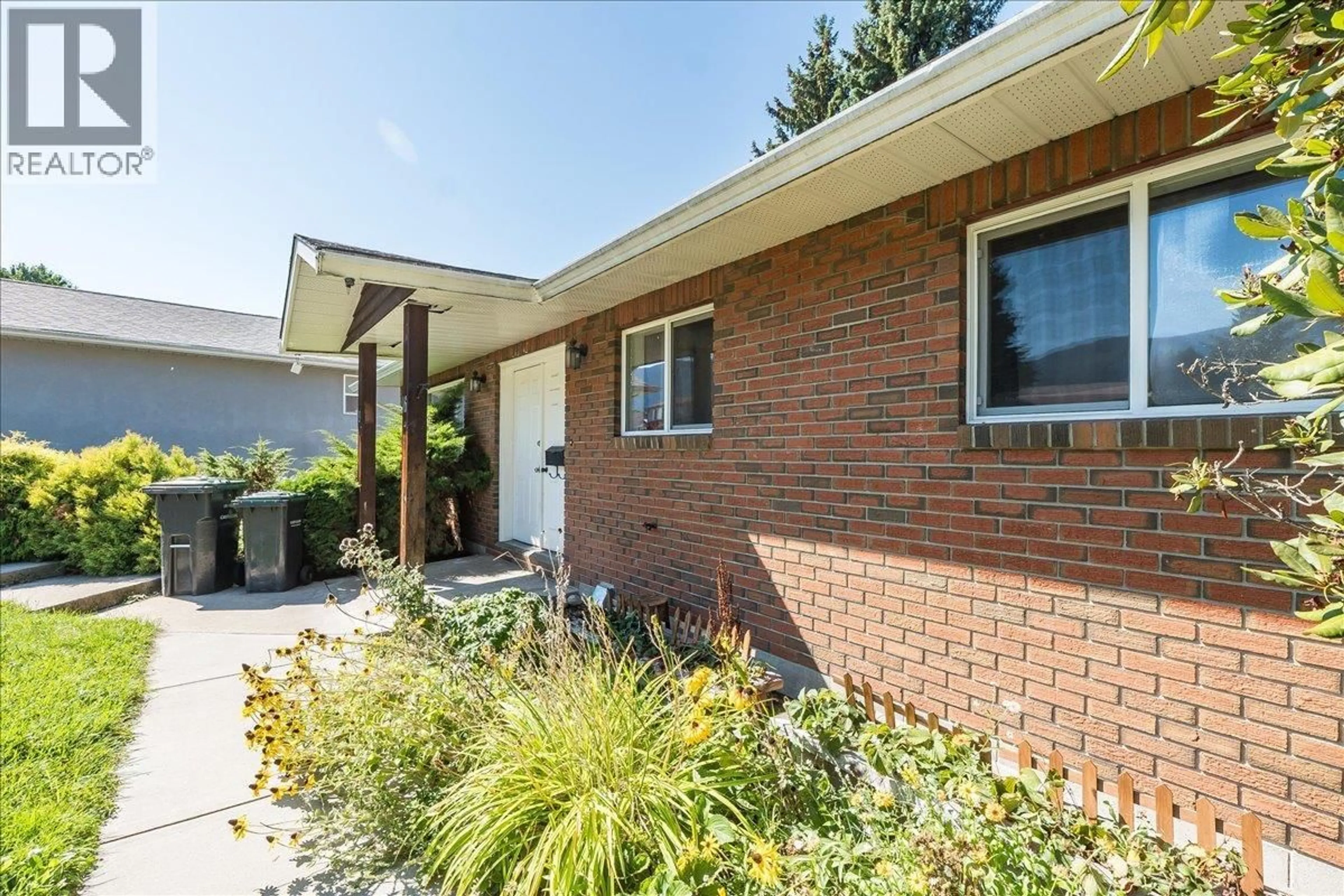 Home with brick exterior material, street for 1916 RIVERSIDE CRESCENT, Castlegar British Columbia V1N3W6