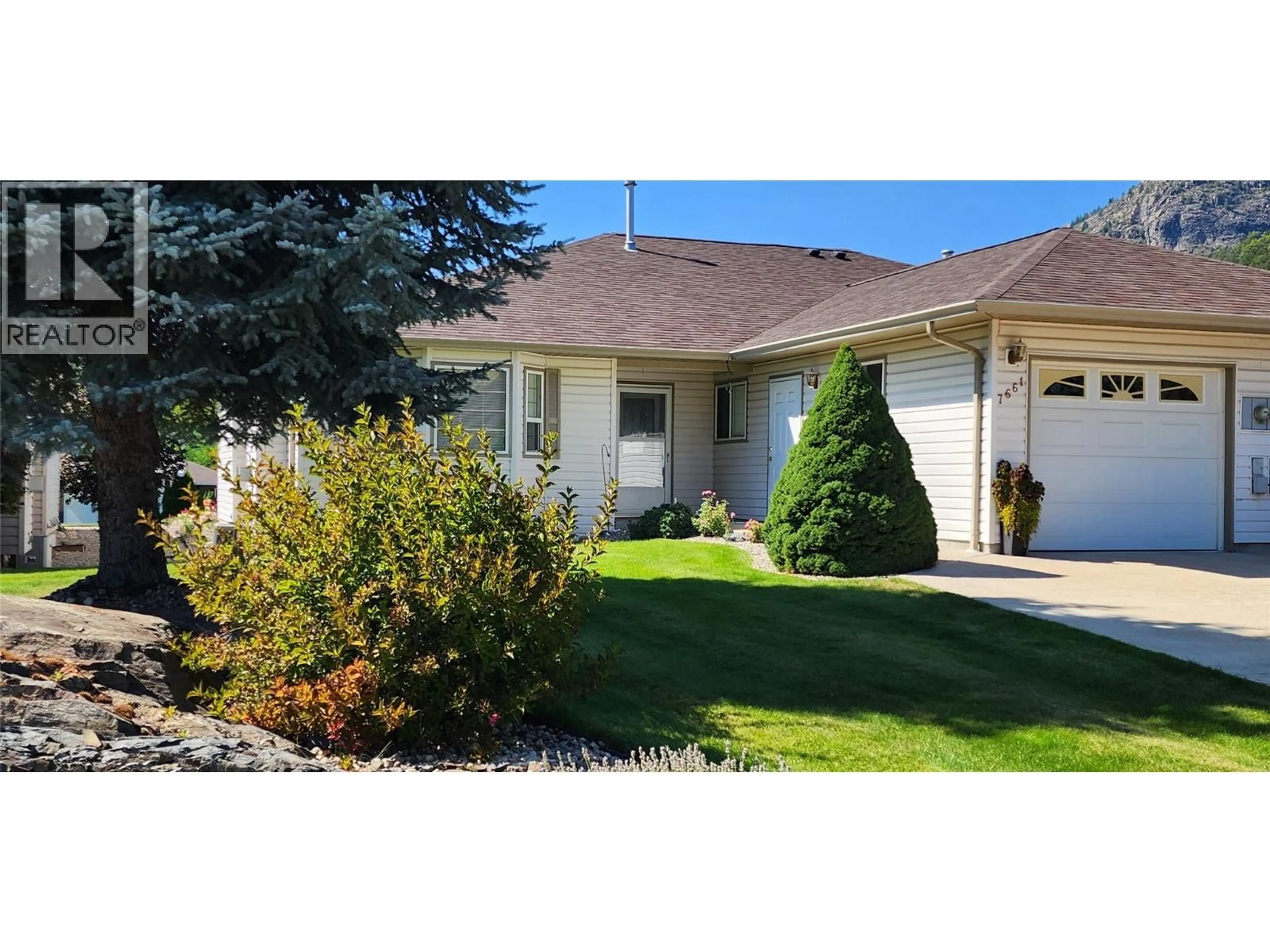 Home with vinyl exterior material, street for 7661 CREMA DRIVE, Trail British Columbia V1R2Y8