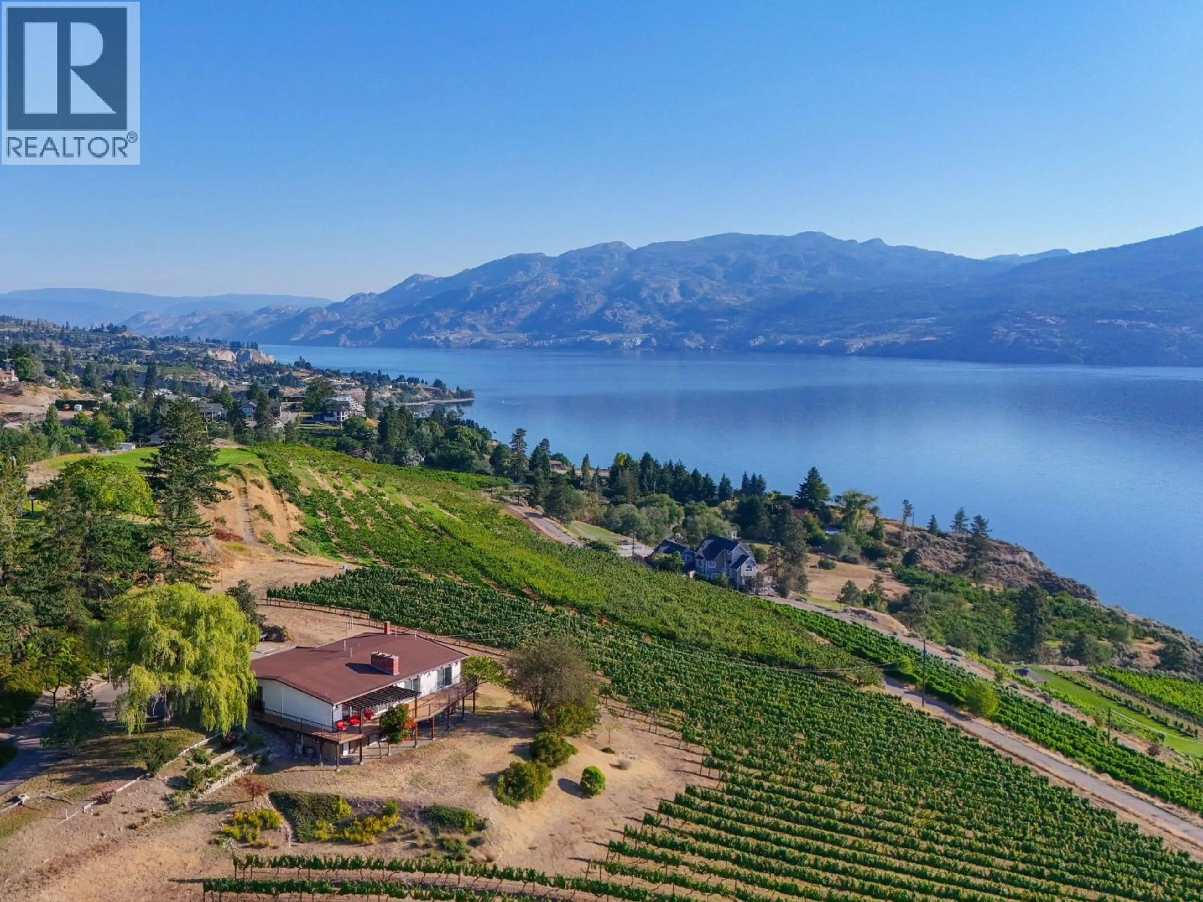 A pic from outside/outdoor area/front of a property/back of a property/a pic from drone, water/lake/river/ocean view for 9402 FRONT BENCH ROAD, Summerland British Columbia V0H1Z4