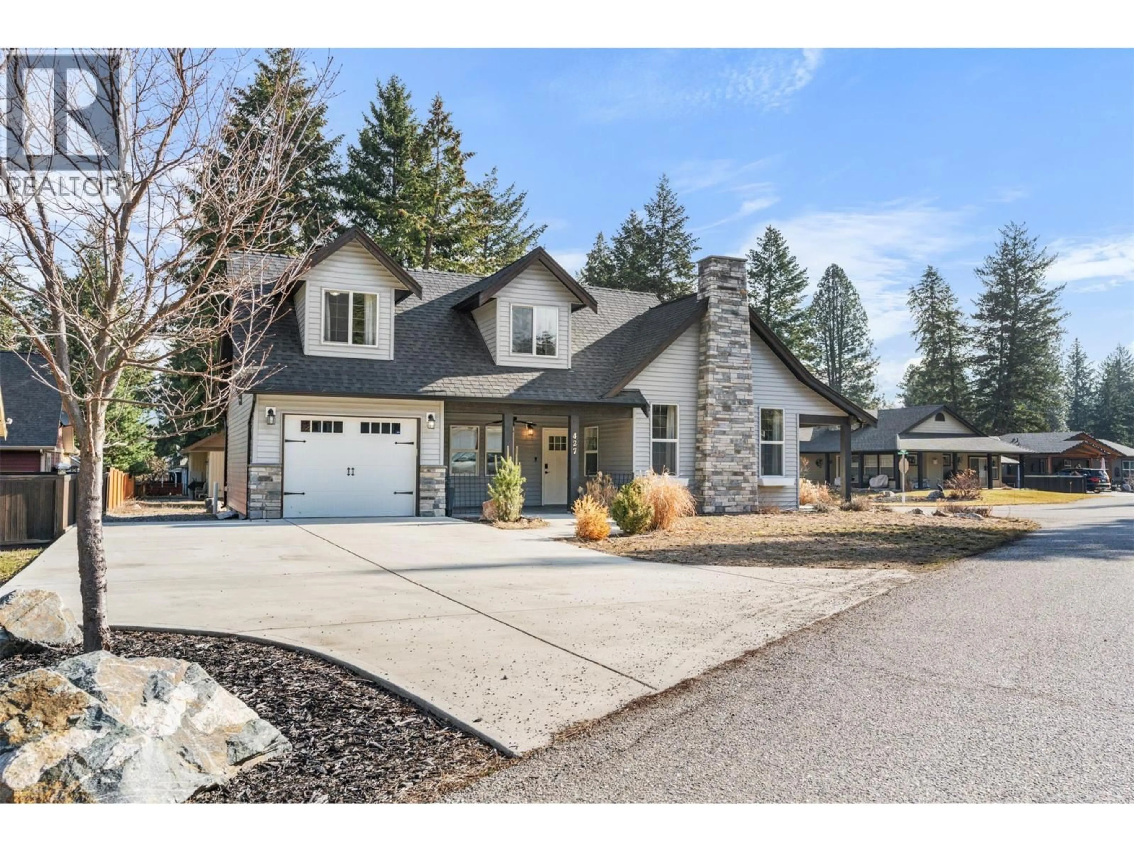 Home with vinyl exterior material, street for 427 HUMMINGBIRD AVENUE, Vernon British Columbia V1H2A1