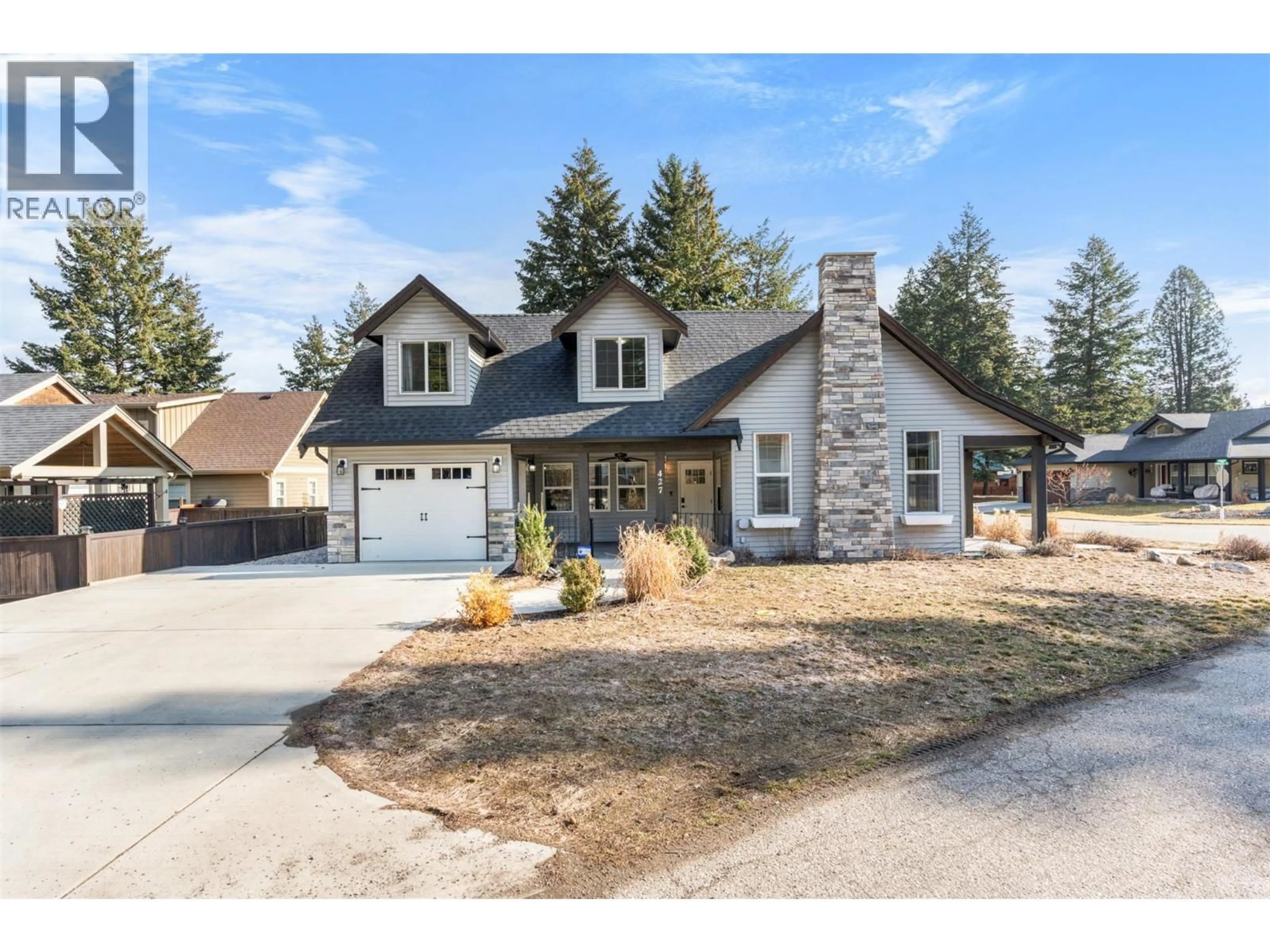 Home with vinyl exterior material, street for 427 HUMMINGBIRD AVENUE, Vernon British Columbia V1H2A1