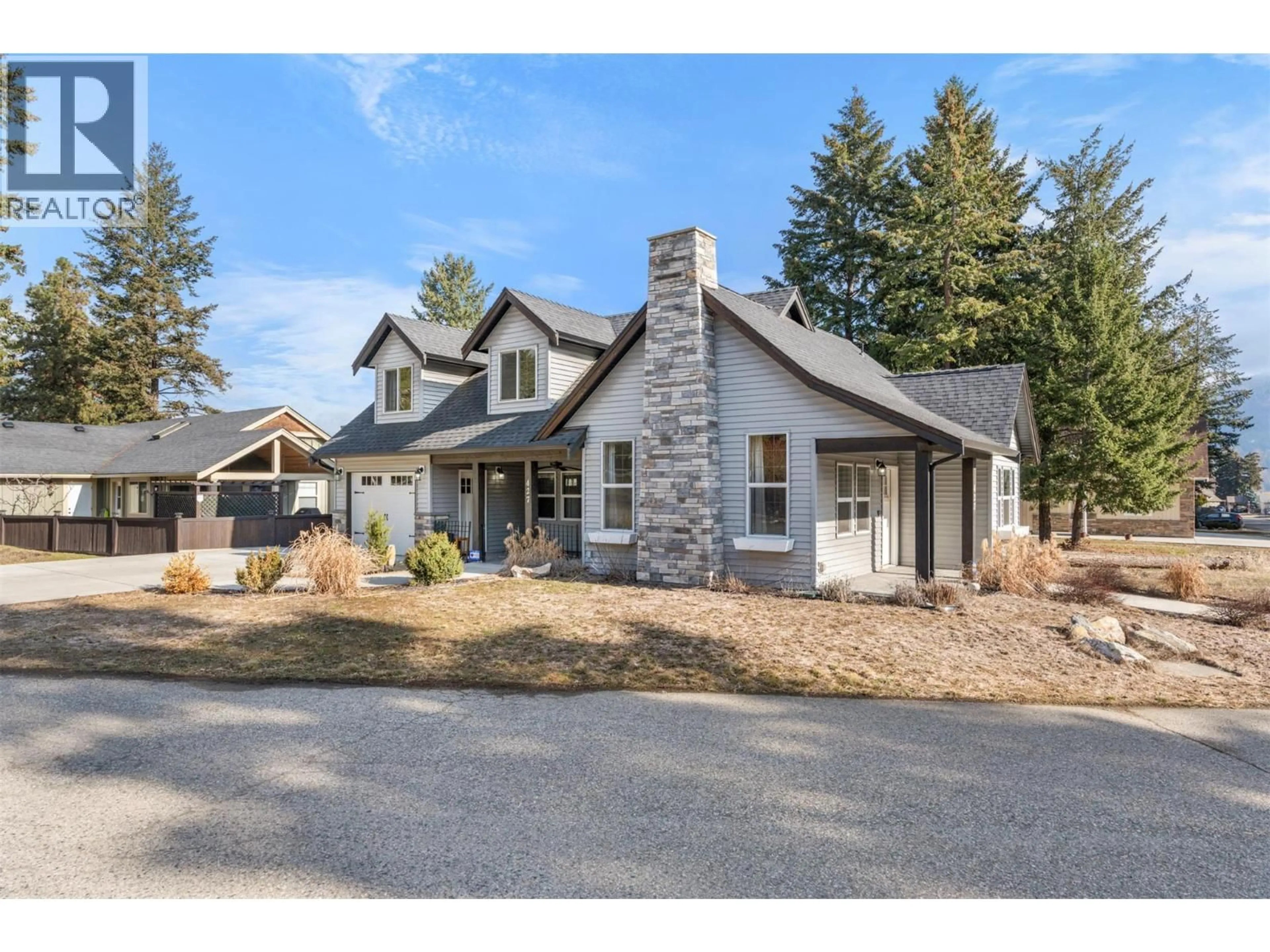 Home with brick exterior material, street for 427 HUMMINGBIRD AVENUE, Vernon British Columbia V1H2A1
