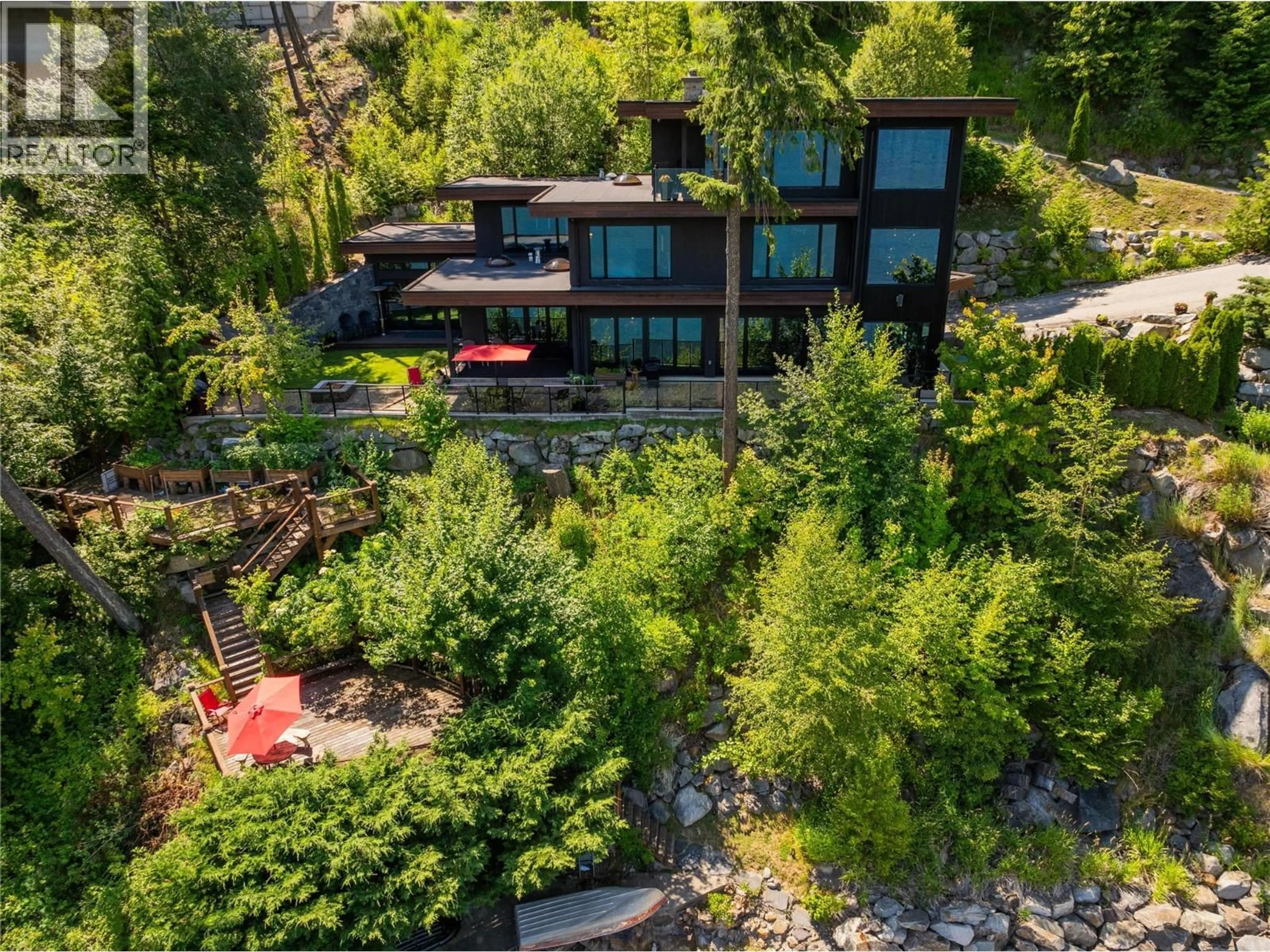 A pic from outside/outdoor area/front of a property/back of a property/a pic from drone, forest/trees view for 59 JOHNSTONE ROAD, Nelson British Columbia V1L6H9
