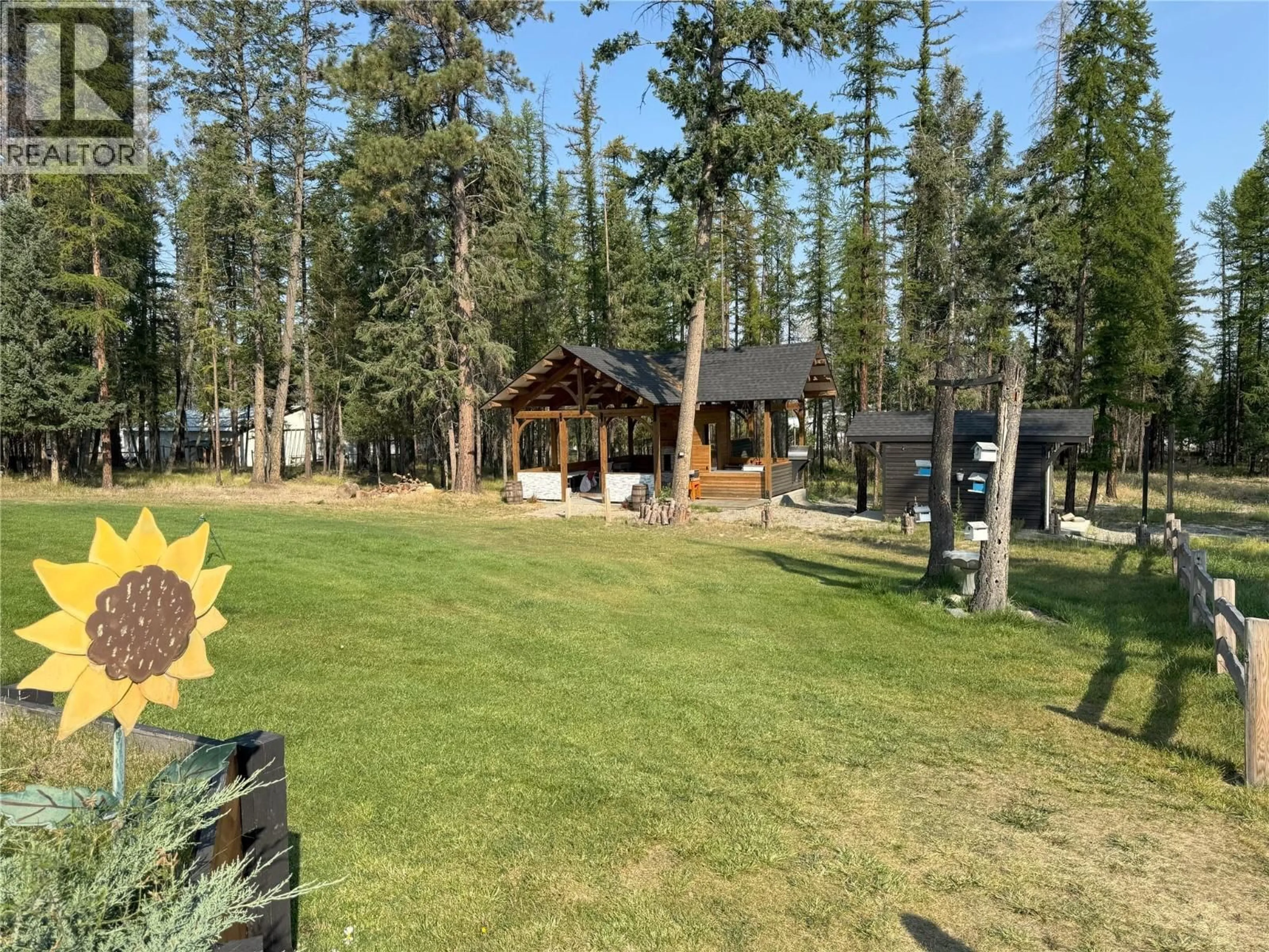 A pic from outside/outdoor area/front of a property/back of a property/a pic from drone, forest/trees view for 1605 24TH AVENUE SOUTH, Cranbrook British Columbia V1C6Y8