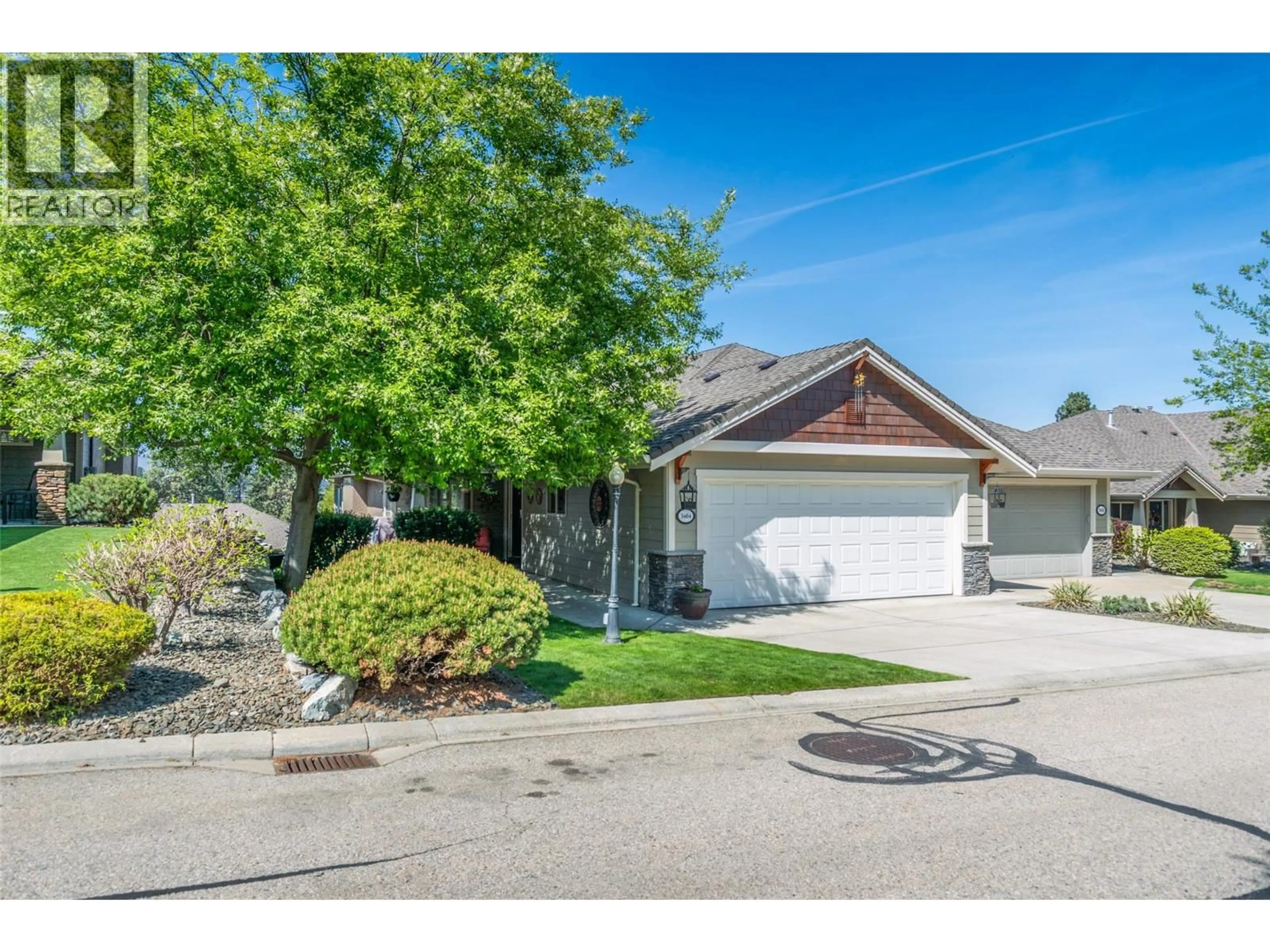 Home with vinyl exterior material, street for 3604 SHADOW CREEK DRIVE, Kelowna British Columbia V1X8A7
