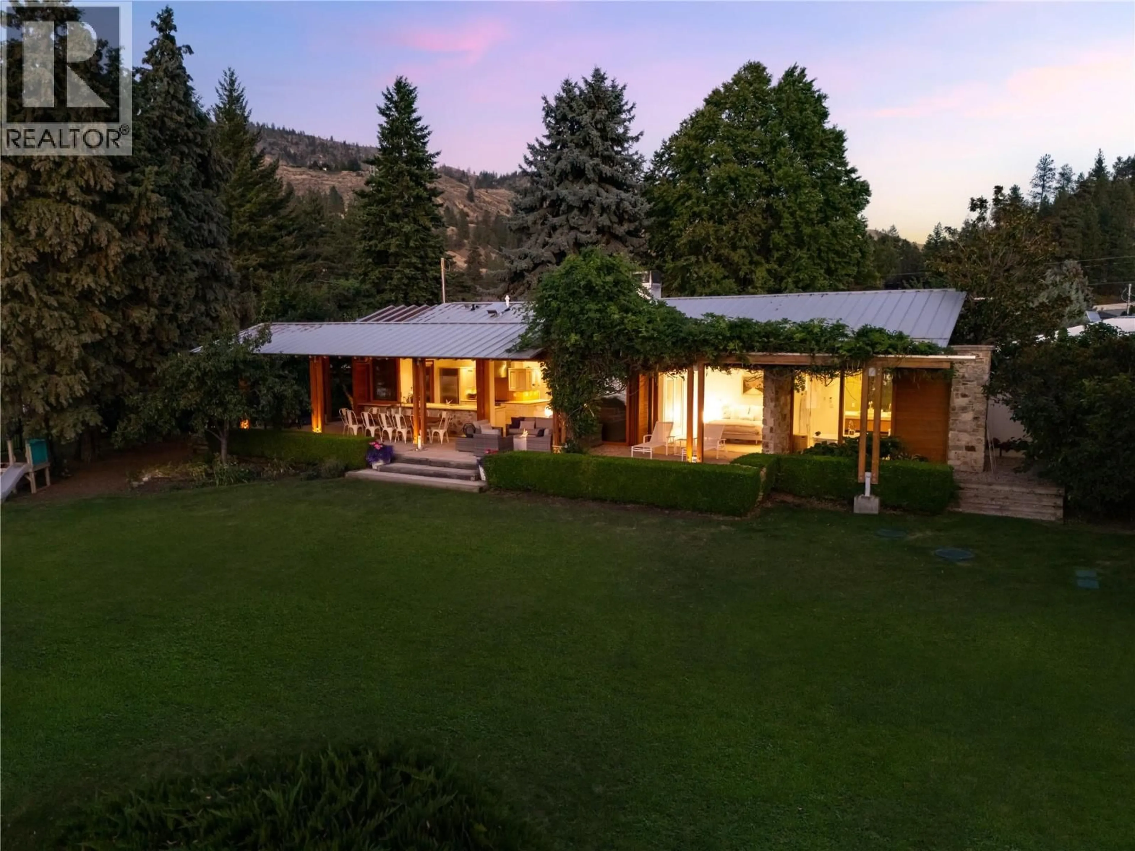 A pic from outside/outdoor area/front of a property/back of a property/a pic from drone, mountain view for 106 DEVON DRIVE, Okanagan Falls British Columbia V0H1R5
