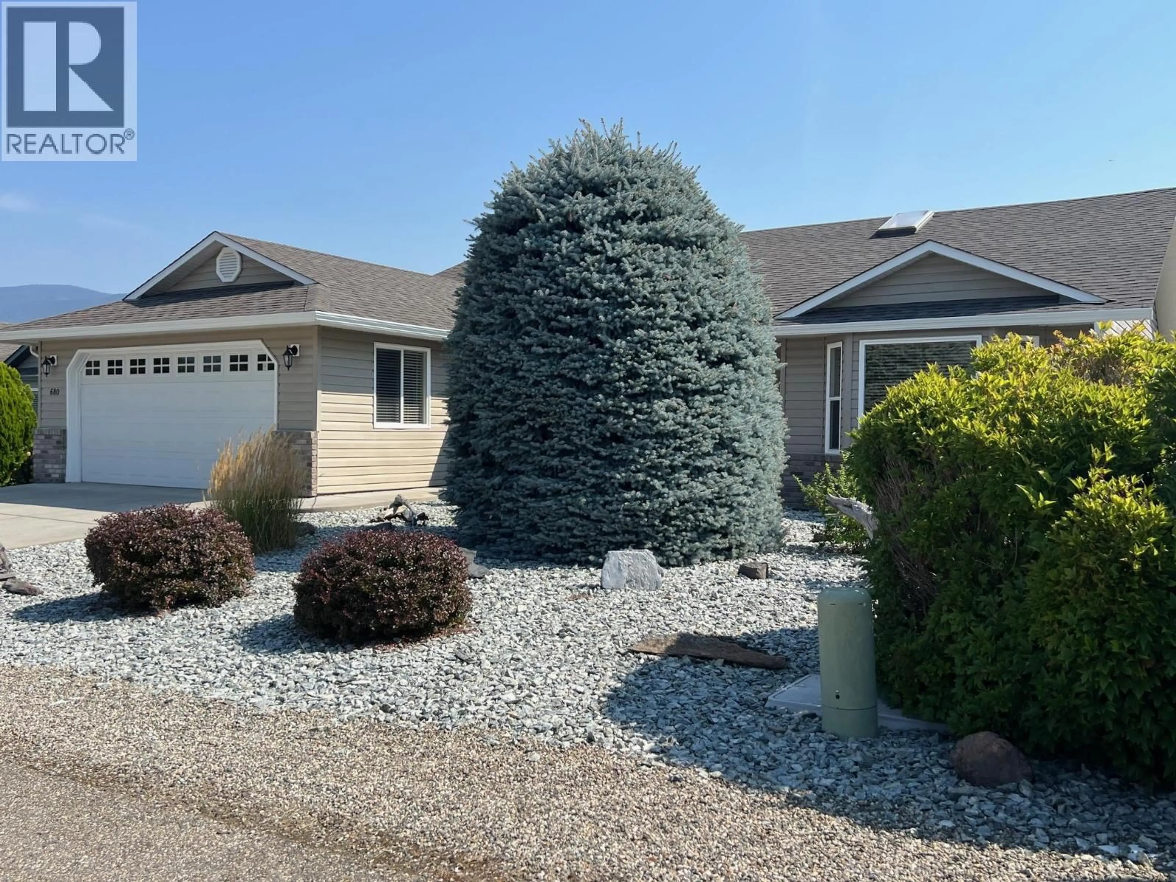 Home with vinyl exterior material, street for 680 6TH STREET, Vernon British Columbia V1H1Z1