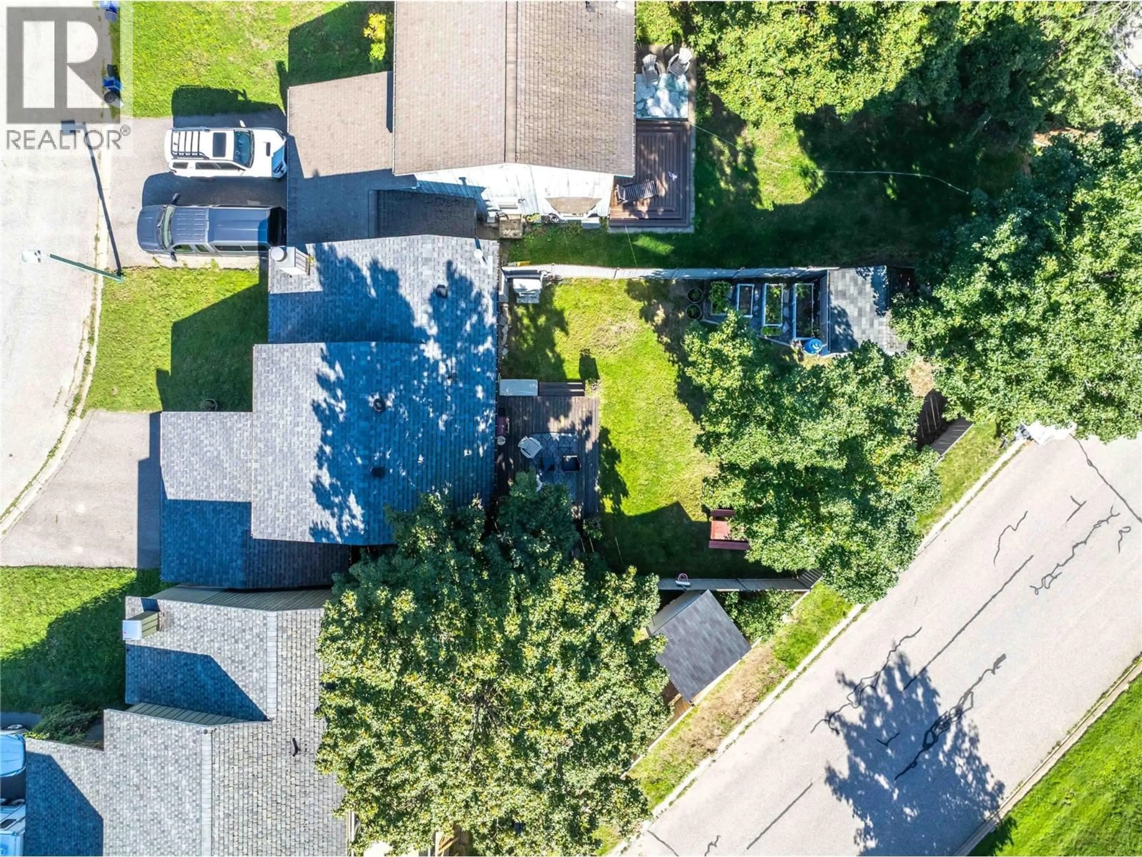 A pic from outside/outdoor area/front of a property/back of a property/a pic from drone, street for 1892 JADE PLACE, Revelstoke British Columbia V0E2S0