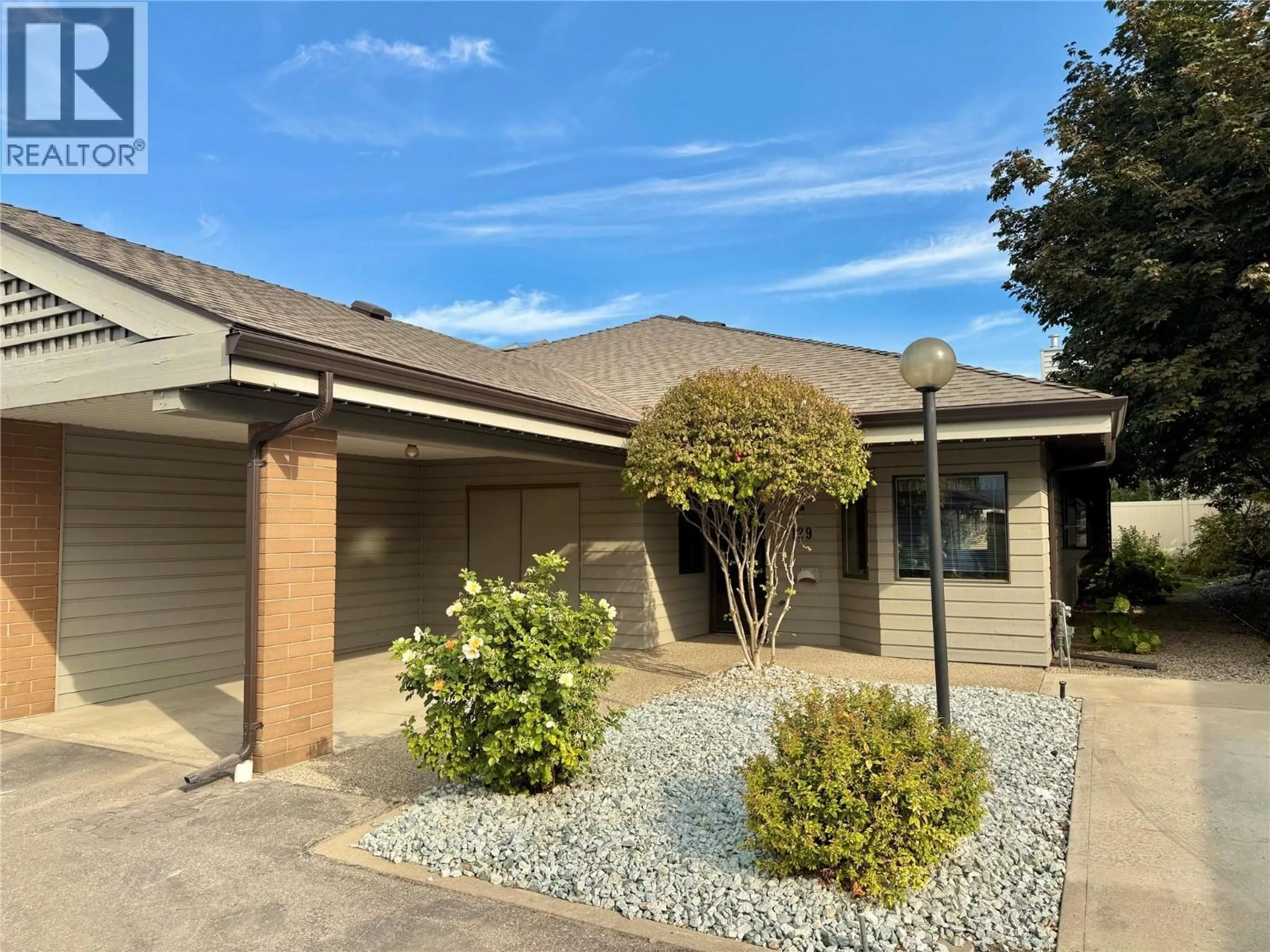 A pic from outside/outdoor area/front of a property/back of a property/a pic from drone, street for 129 - 1765 LECKIE ROAD, Kelowna British Columbia V1X6X5
