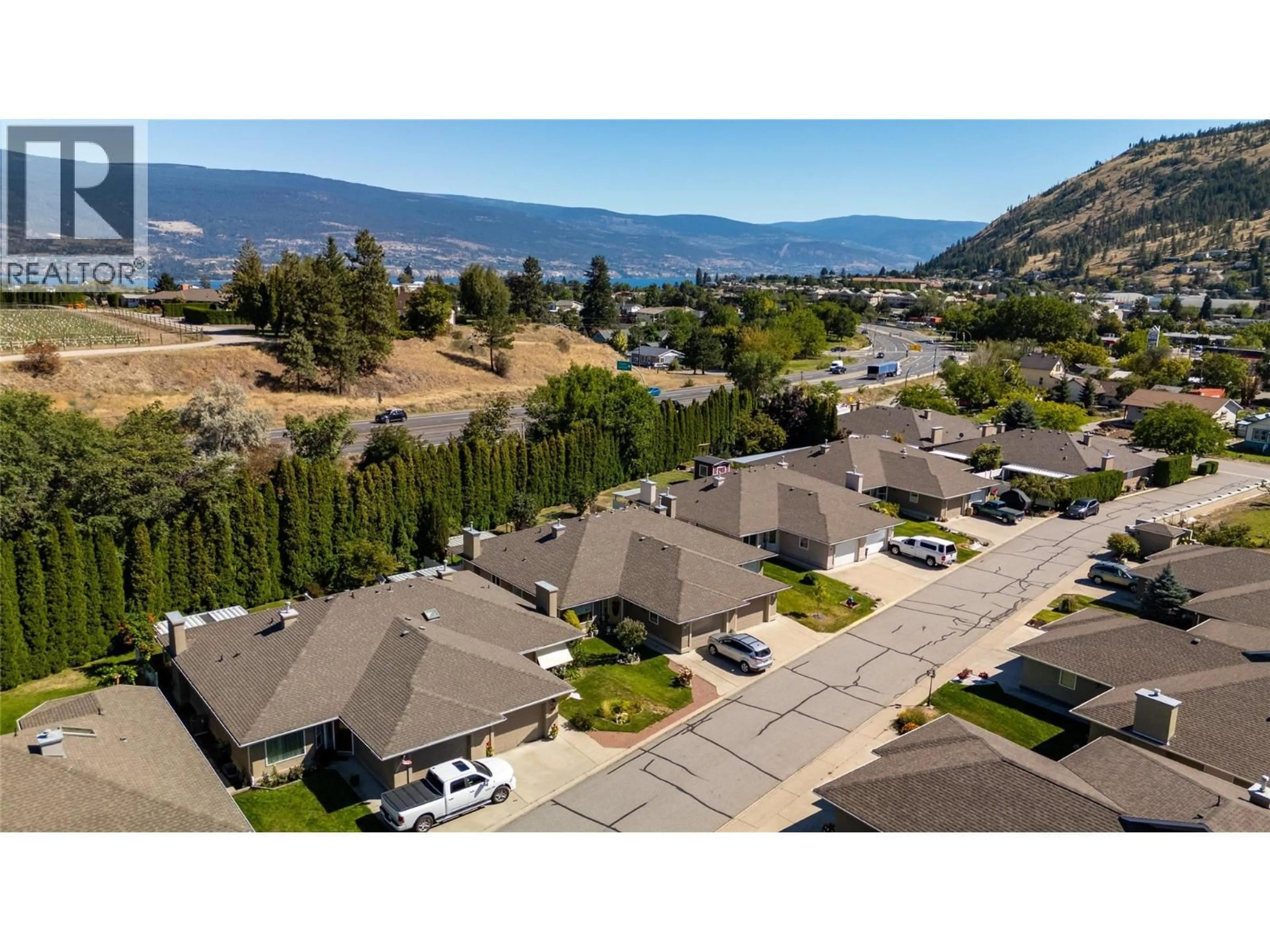 A pic from outside/outdoor area/front of a property/back of a property/a pic from drone, mountain view for 23 - 9600 TURNER STREET, Summerland British Columbia V0H1Z0