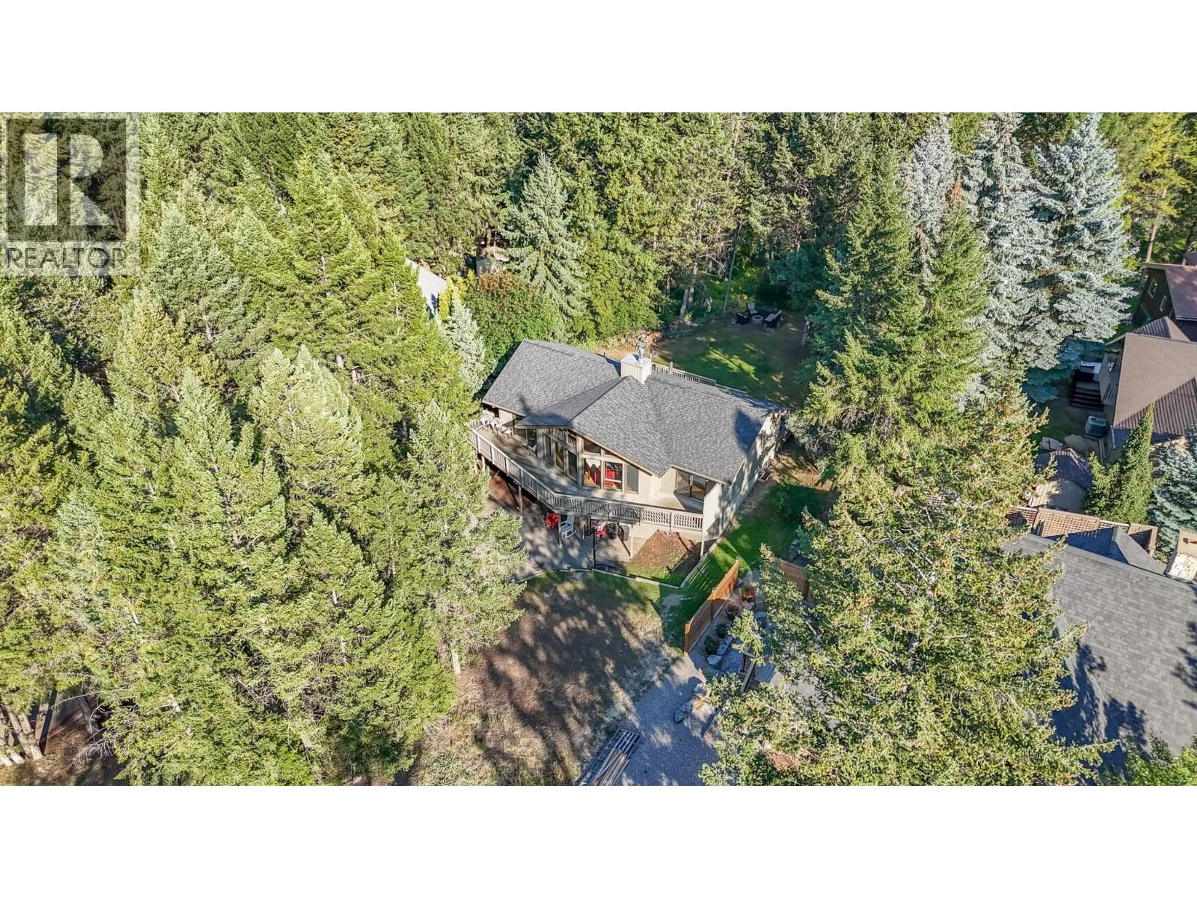 A pic from outside/outdoor area/front of a property/back of a property/a pic from drone, forest/trees view for 1060 RIDGE WAY, Windermere British Columbia V0A1K3