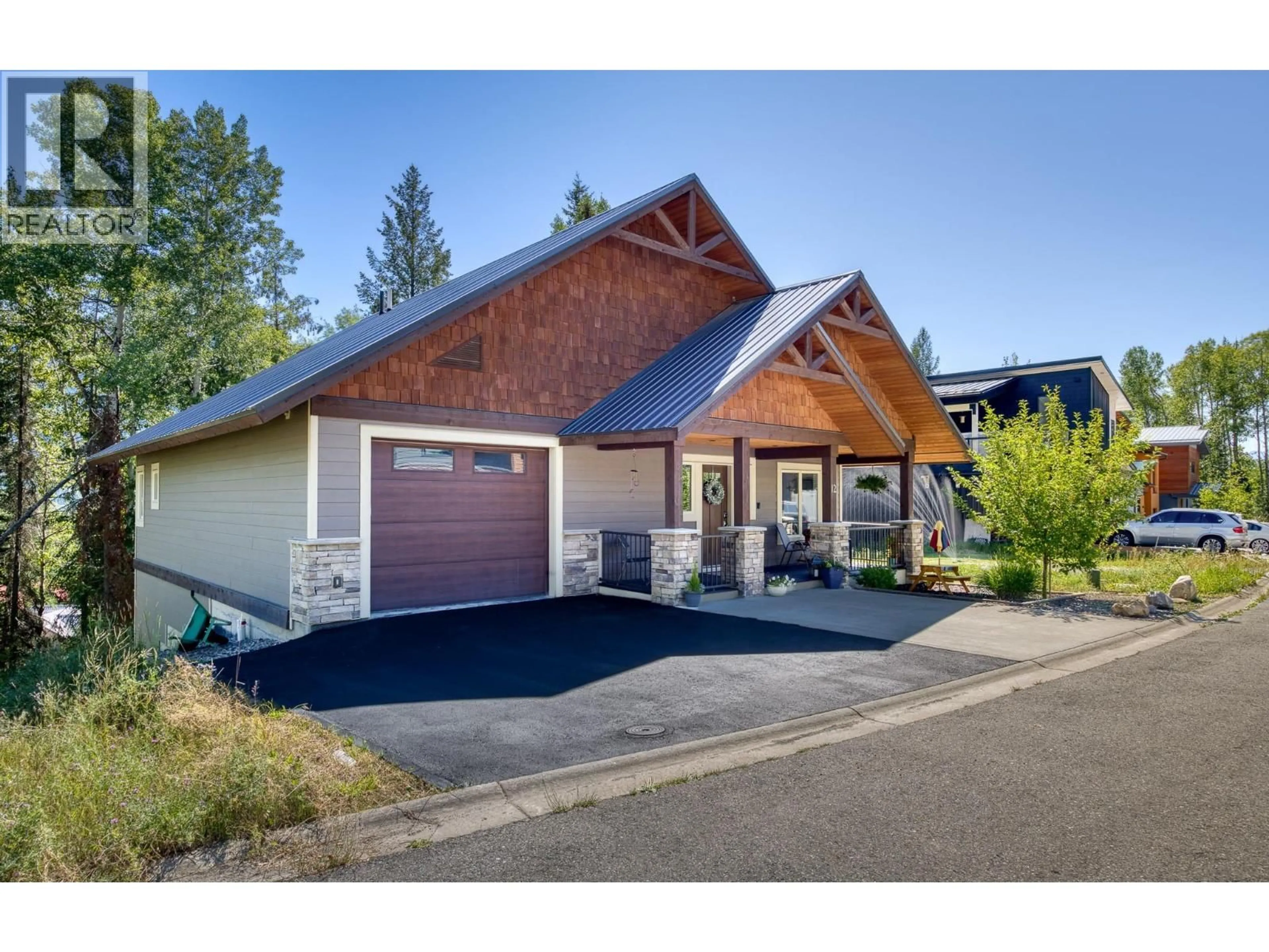 Home with vinyl exterior material, street for 12 ALPINE TRAIL PLACE, Fernie British Columbia V0B1M5