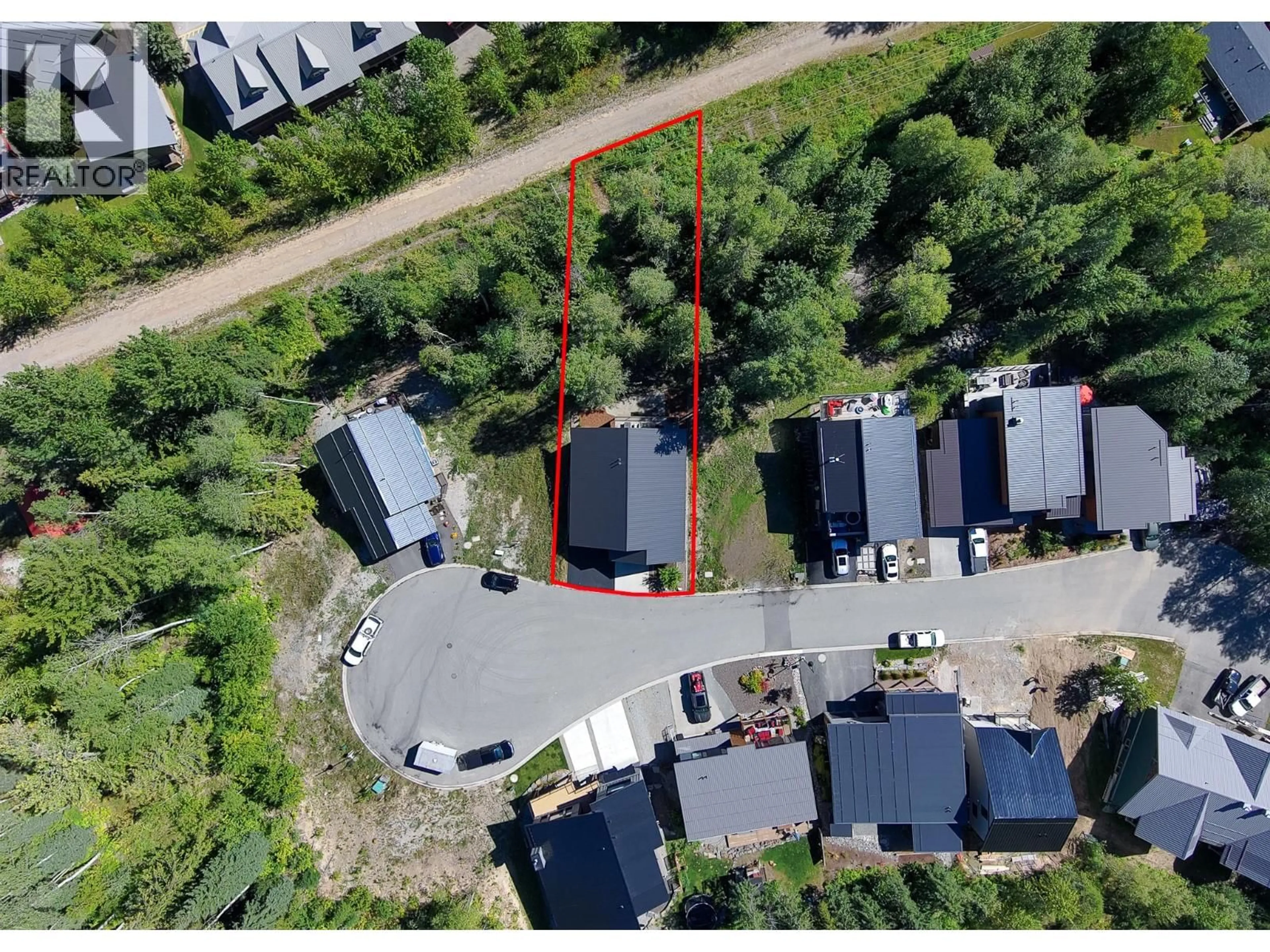 A pic from outside/outdoor area/front of a property/back of a property/a pic from drone, street for 12 ALPINE TRAIL PLACE, Fernie British Columbia V0B1M5