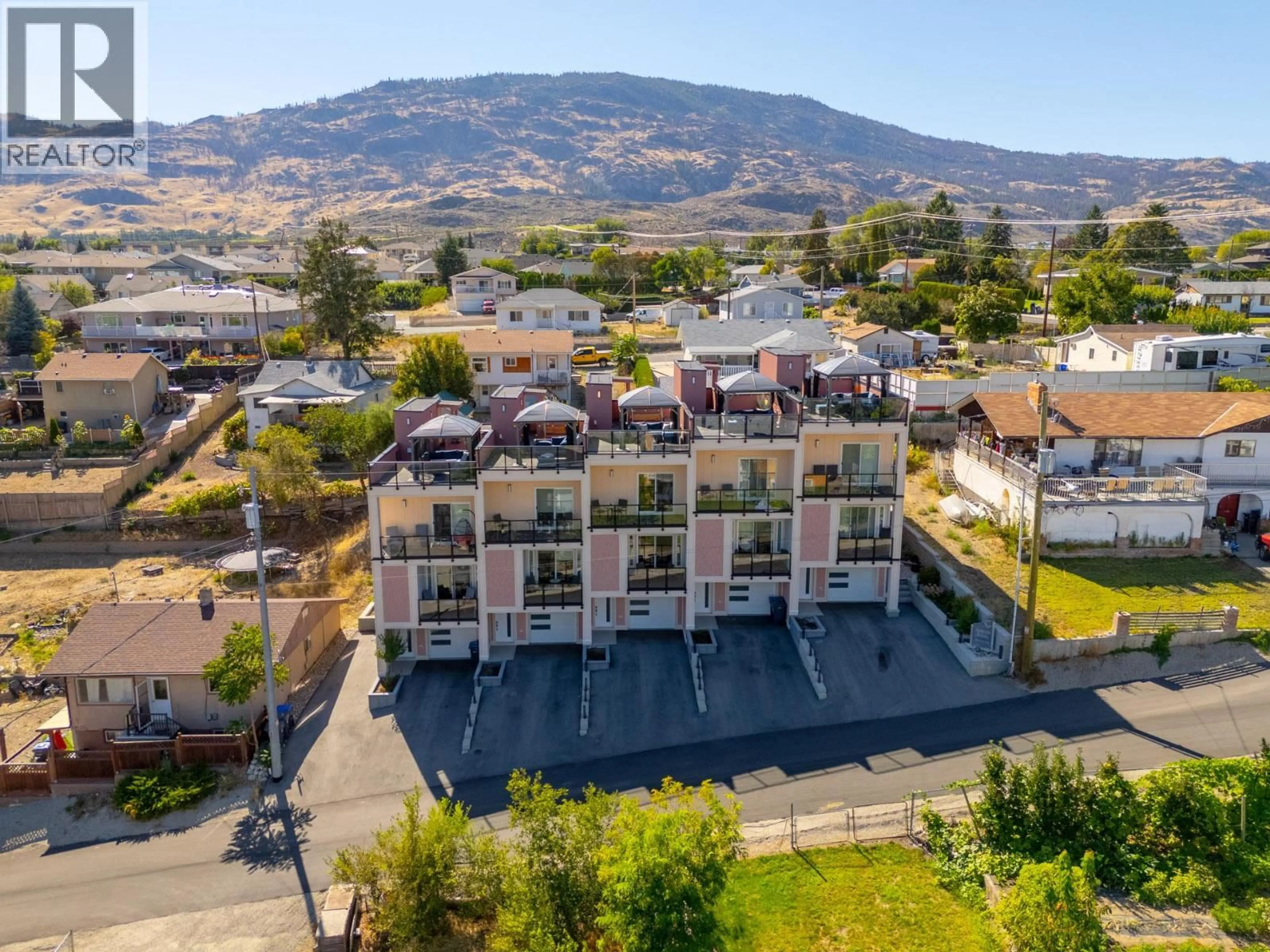 A pic from outside/outdoor area/front of a property/back of a property/a pic from drone, mountain view for 3 - 18 LOON CRESCENT, Osoyoos British Columbia V0H1V1