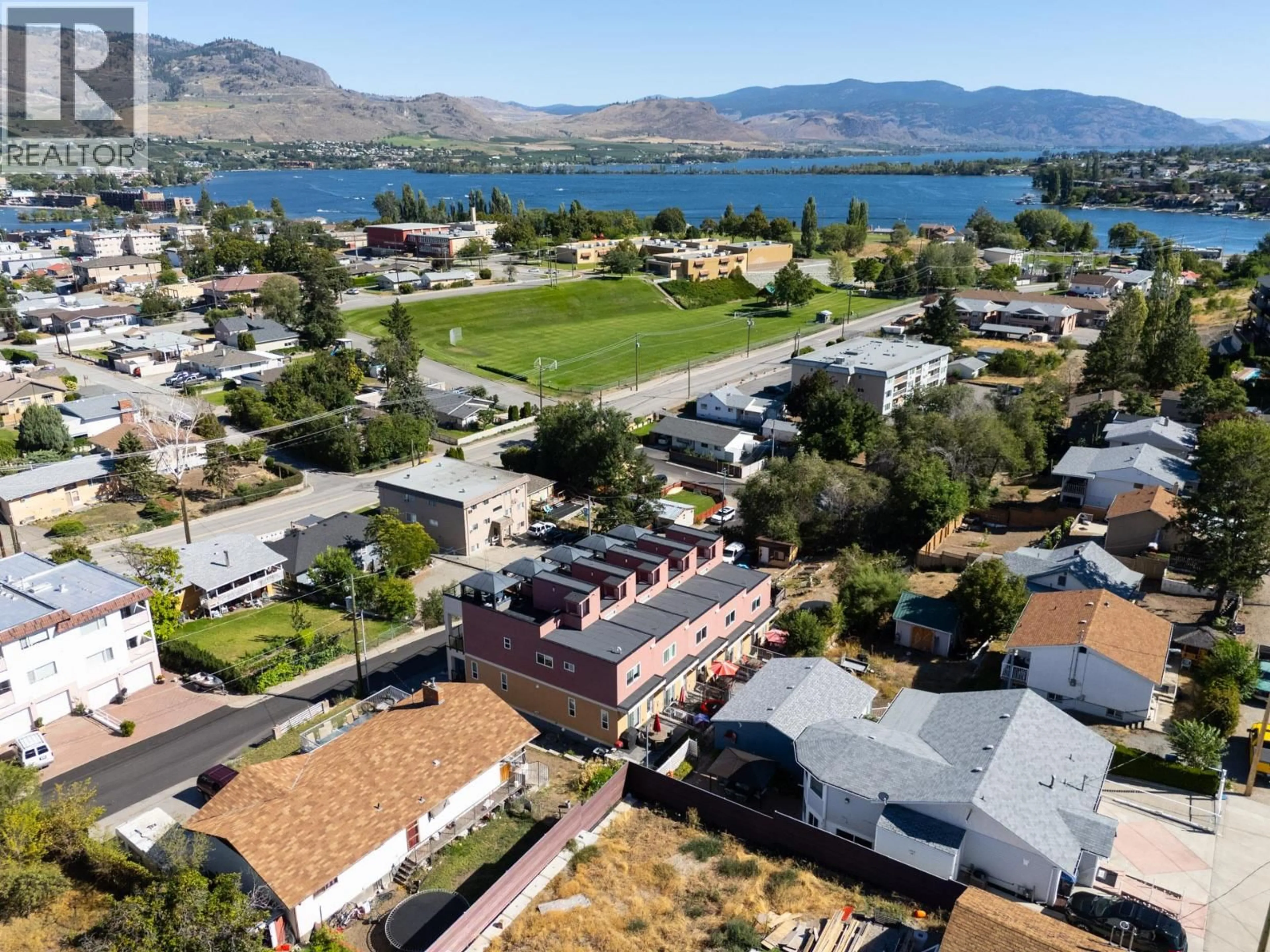 A pic from outside/outdoor area/front of a property/back of a property/a pic from drone, mountain view for 3 - 18 LOON CRESCENT, Osoyoos British Columbia V0H1V1