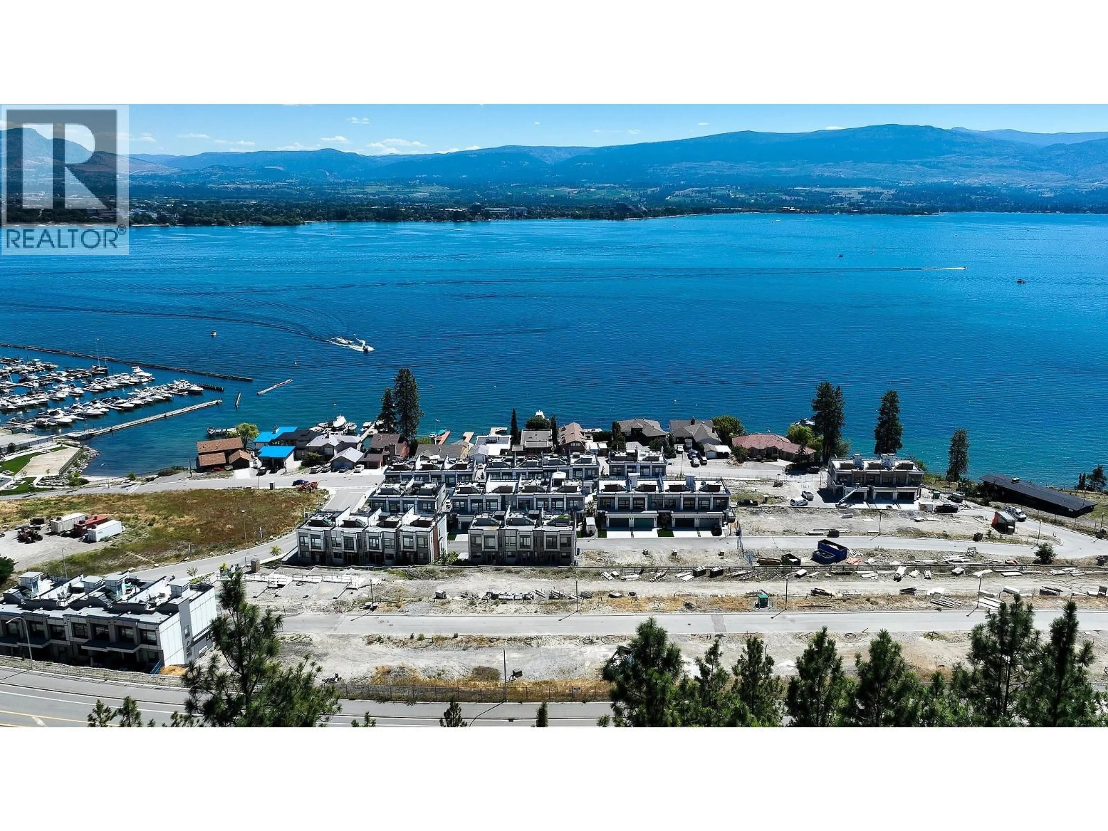 A pic from outside/outdoor area/front of a property/back of a property/a pic from drone, water/lake/river/ocean view for 157 - 2100 CAMPBELL ROAD, West Kelowna British Columbia V1Z1S9