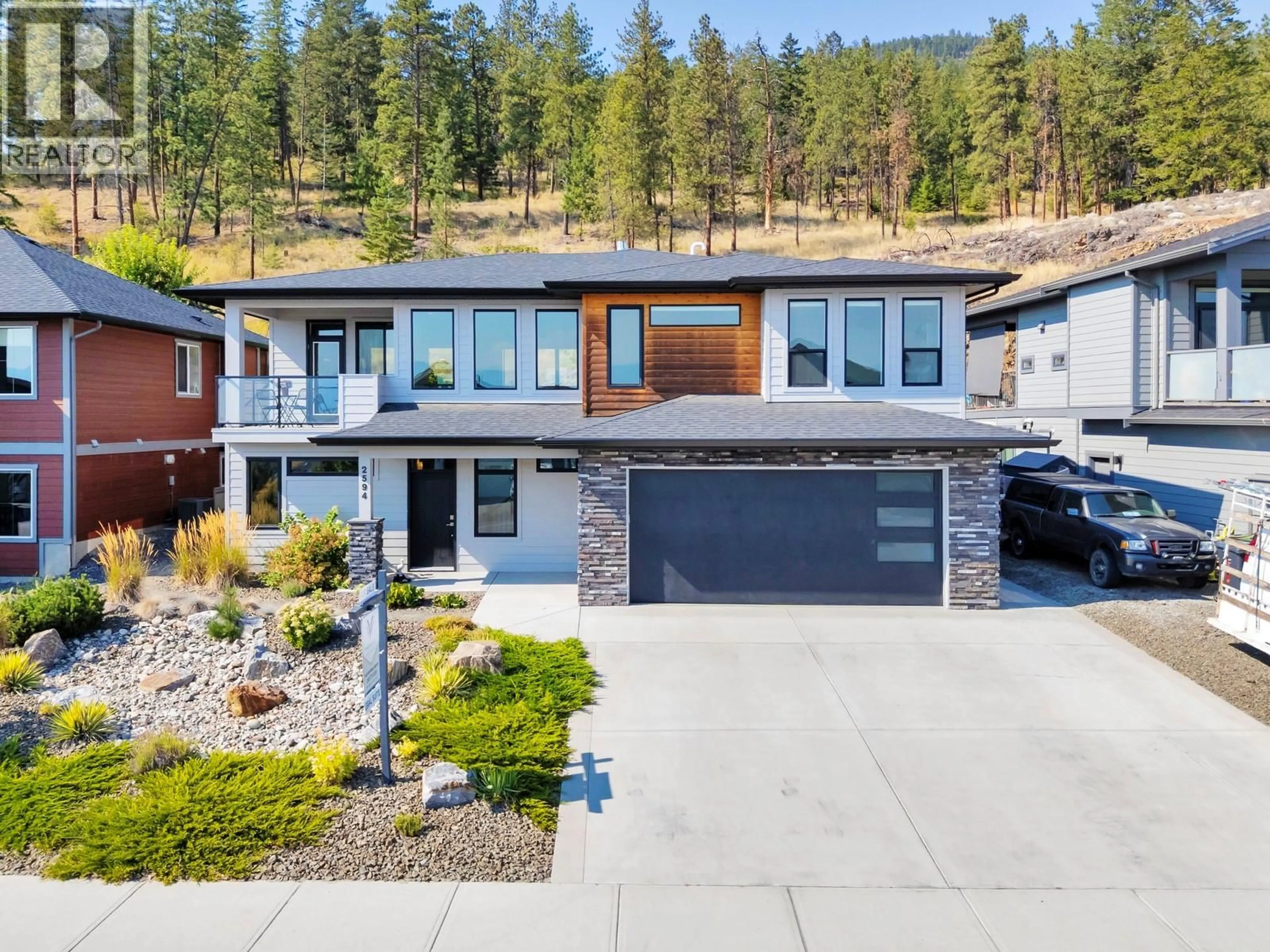 Home with vinyl exterior material, mountain view for 2594 CROWN CREST DRIVE, West Kelowna British Columbia V4T3N3