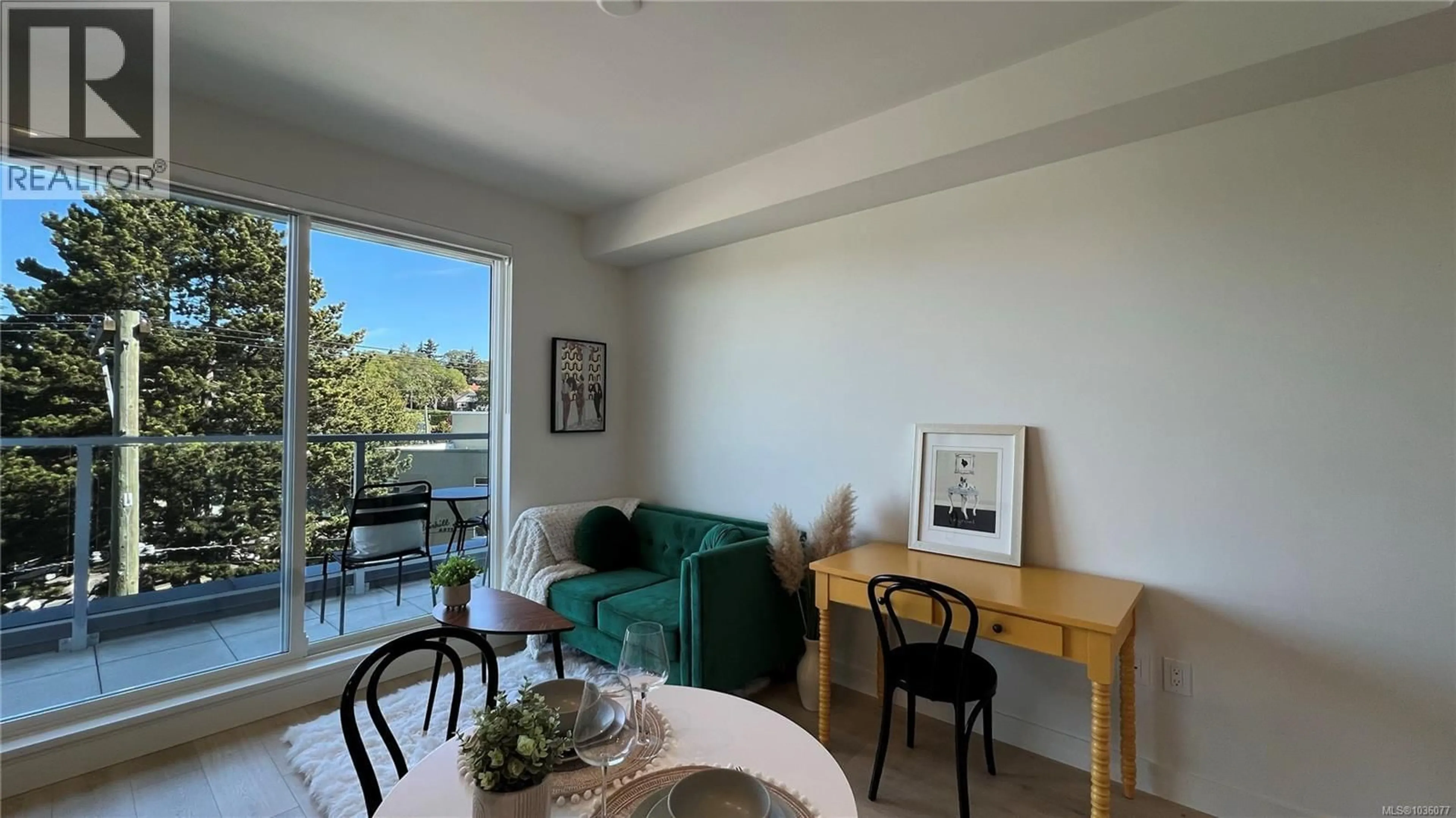 Living room with furniture, wood/laminate floor for 404 - 1301 HILLSIDE AVENUE, Victoria British Columbia V8T2B3