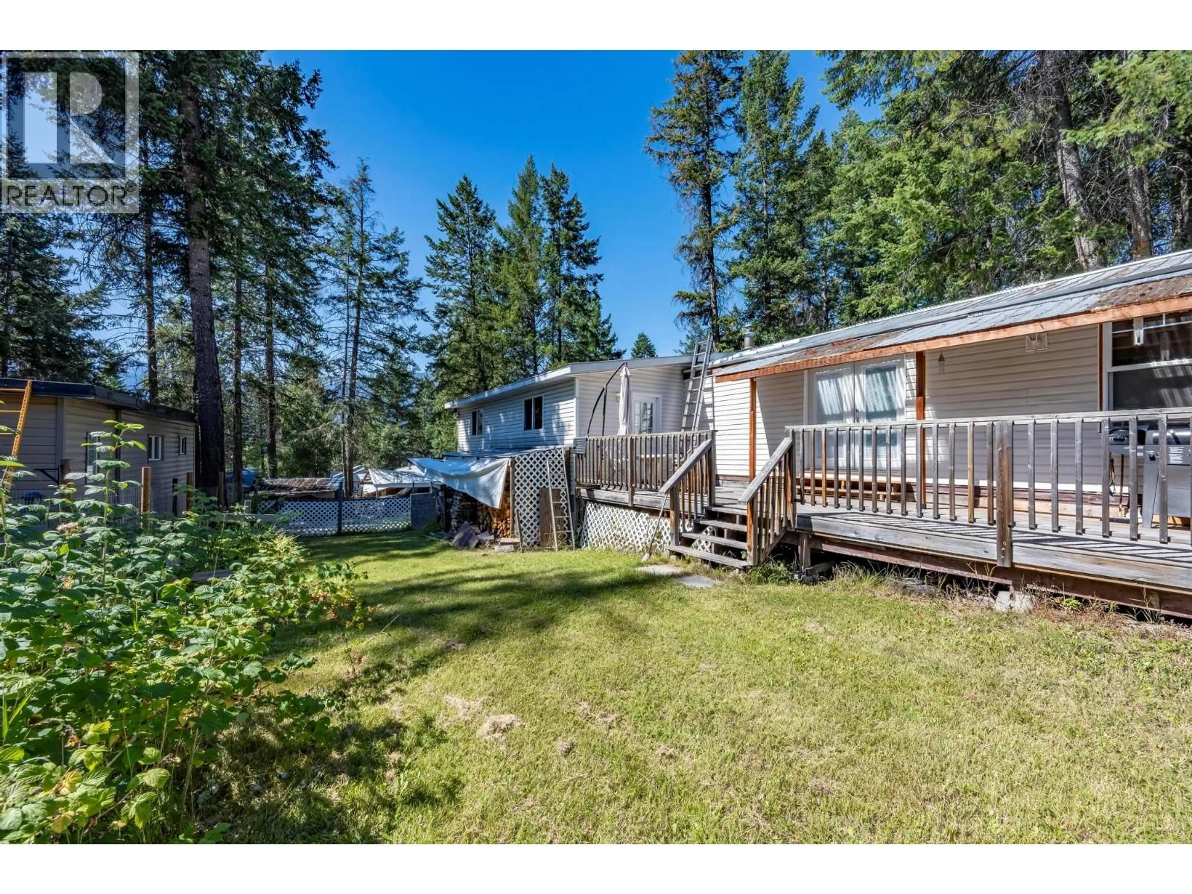 A pic from outside/outdoor area/front of a property/back of a property/a pic from drone, unknown for 31 - 470 REFLECTION LAKE ROAD, Golden British Columbia V0A1H2