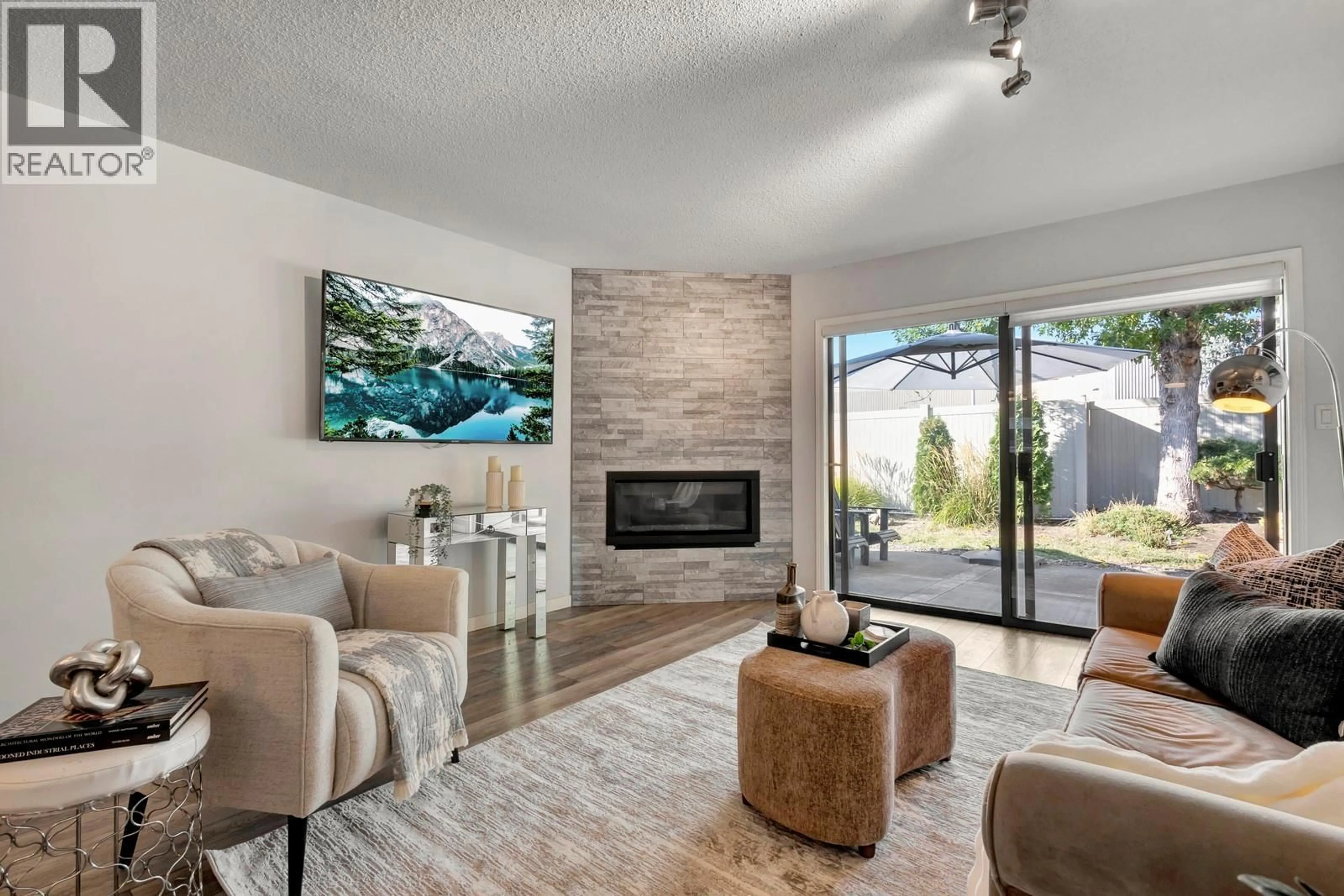 Living room with furniture, ceramic/tile floor for 115 - 1765 LECKIE ROAD, Kelowna British Columbia V1X6X5