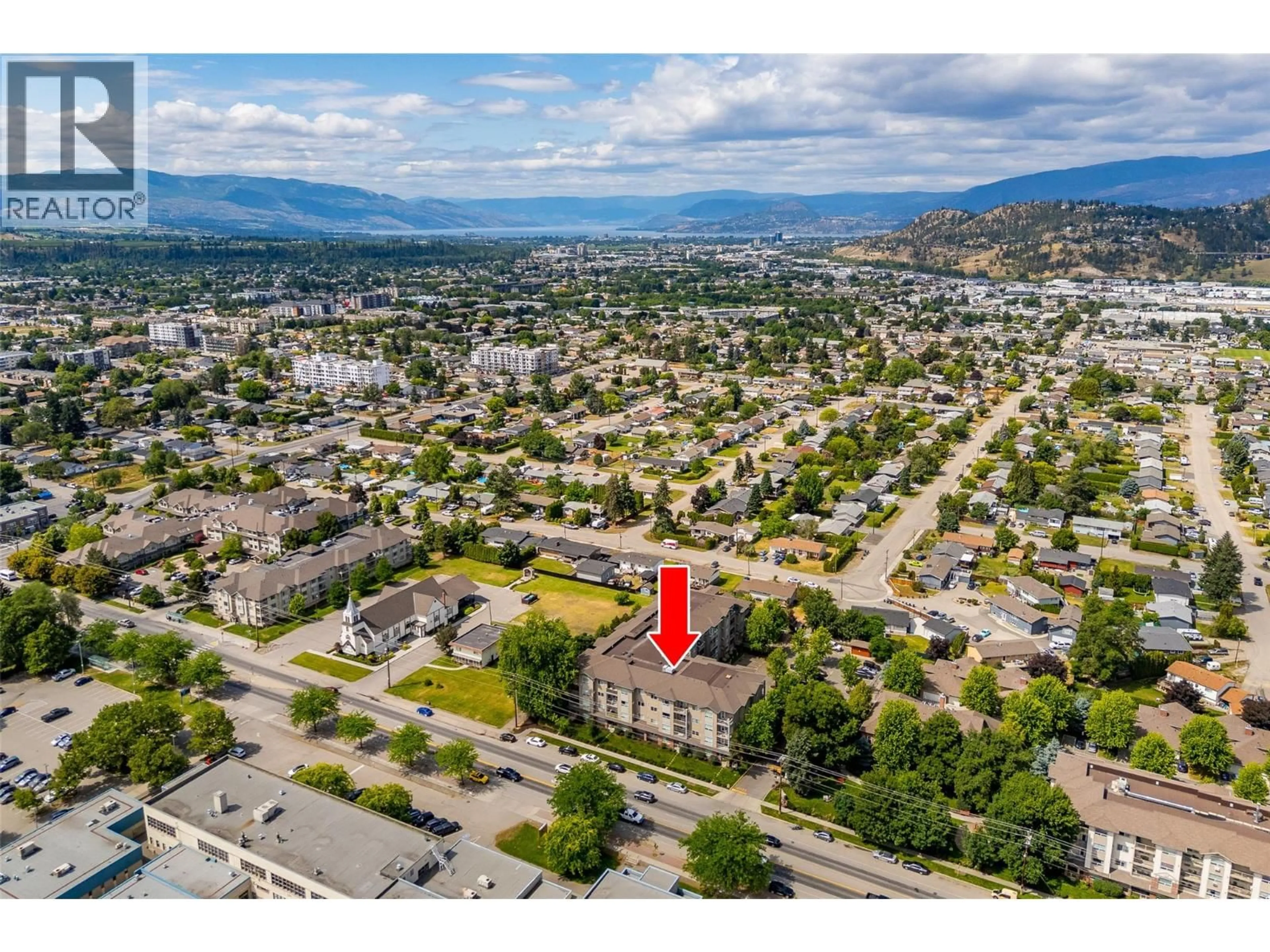 A pic from outside/outdoor area/front of a property/back of a property/a pic from drone, mountain view for 311 - 770 RUTLAND ROAD, Kelowna British Columbia V1X3B7