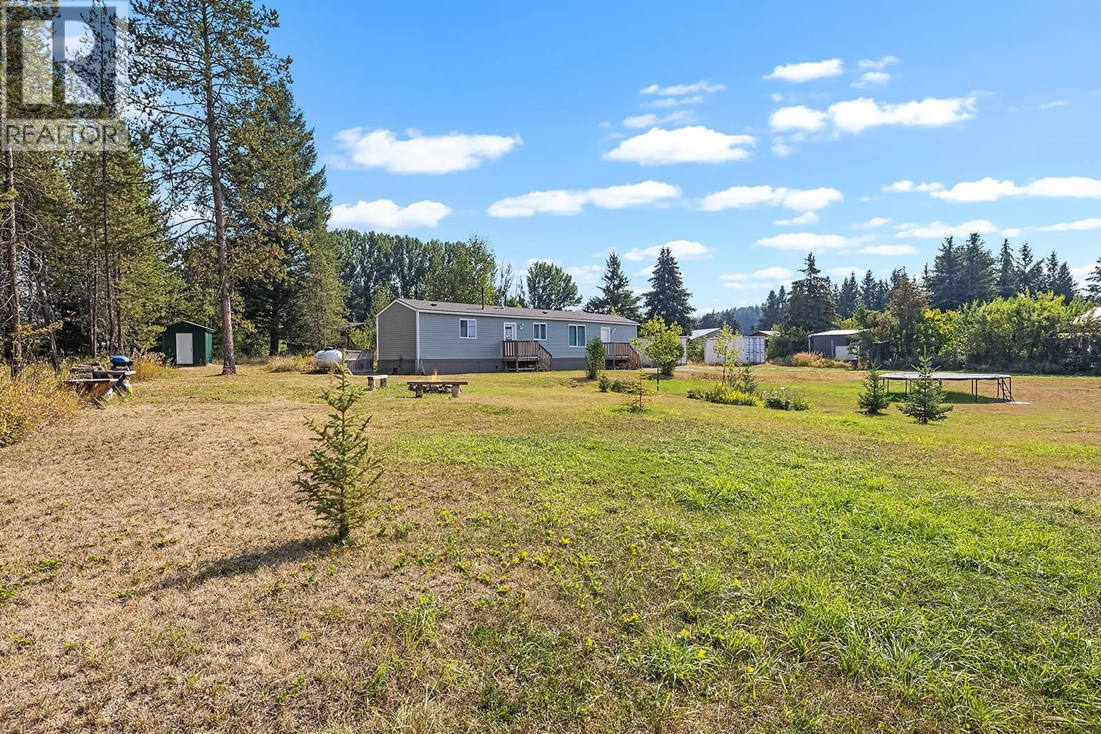 A pic from outside/outdoor area/front of a property/back of a property/a pic from drone, unknown for 7306 BERTRAND ROAD, Jaffray British Columbia V0B1T0