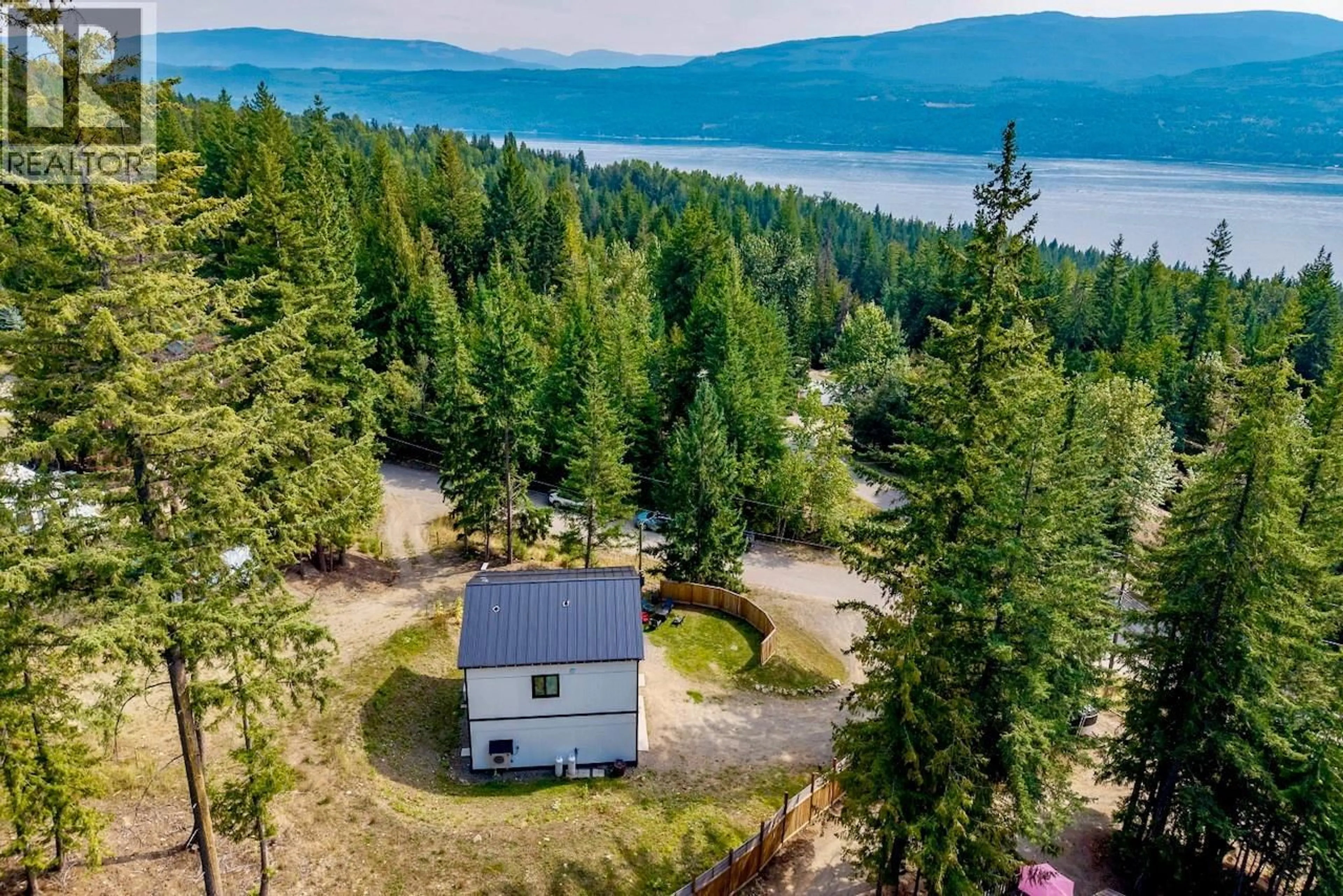 A pic from outside/outdoor area/front of a property/back of a property/a pic from drone, water/lake/river/ocean view for 2731 FAIRVIEW ROAD, Anglemont British Columbia V0E1M8