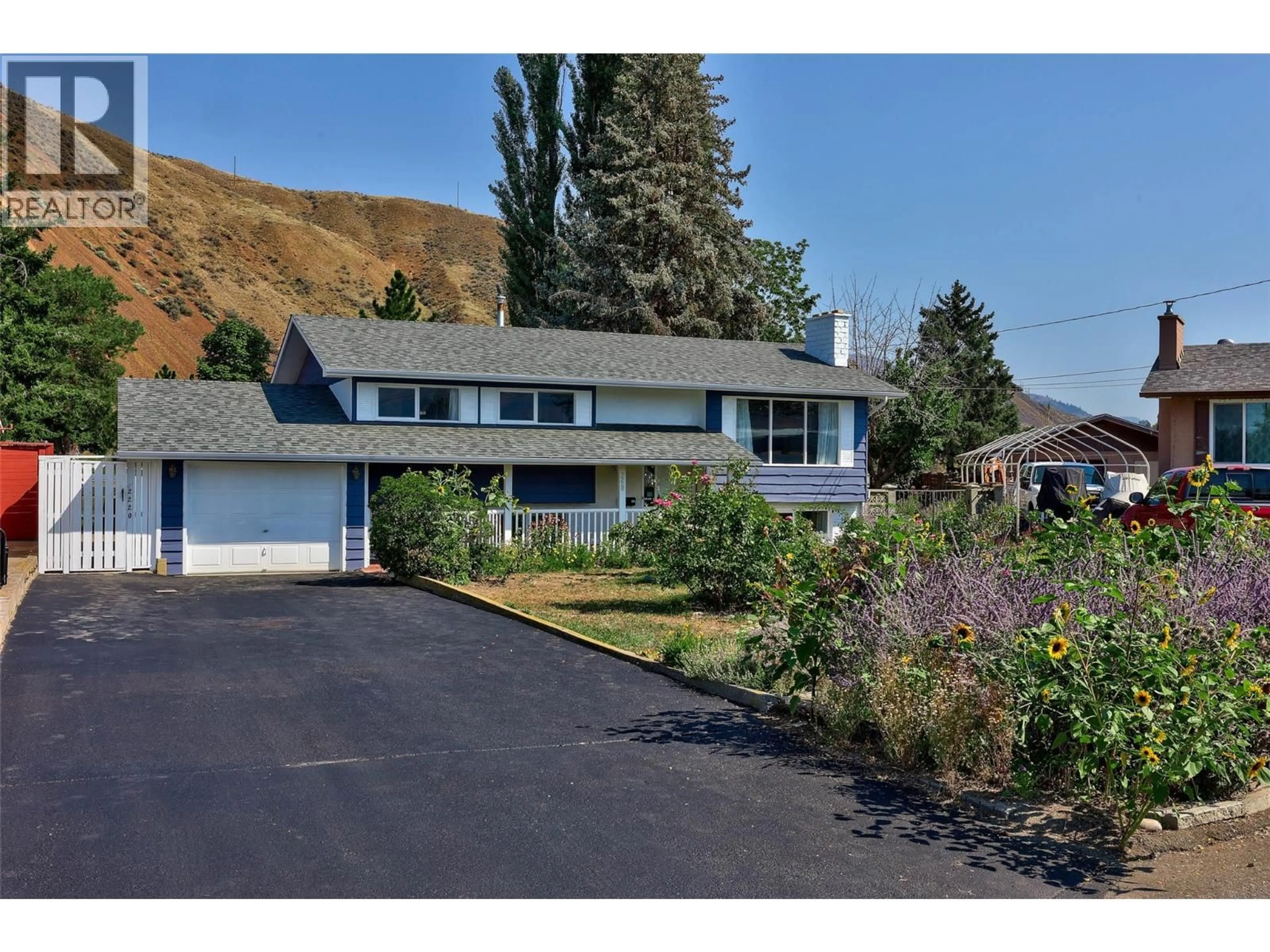 A pic from outside/outdoor area/front of a property/back of a property/a pic from drone, mountain view for 2220 SHANNON PLACE, Kamloops British Columbia V2B4Z4