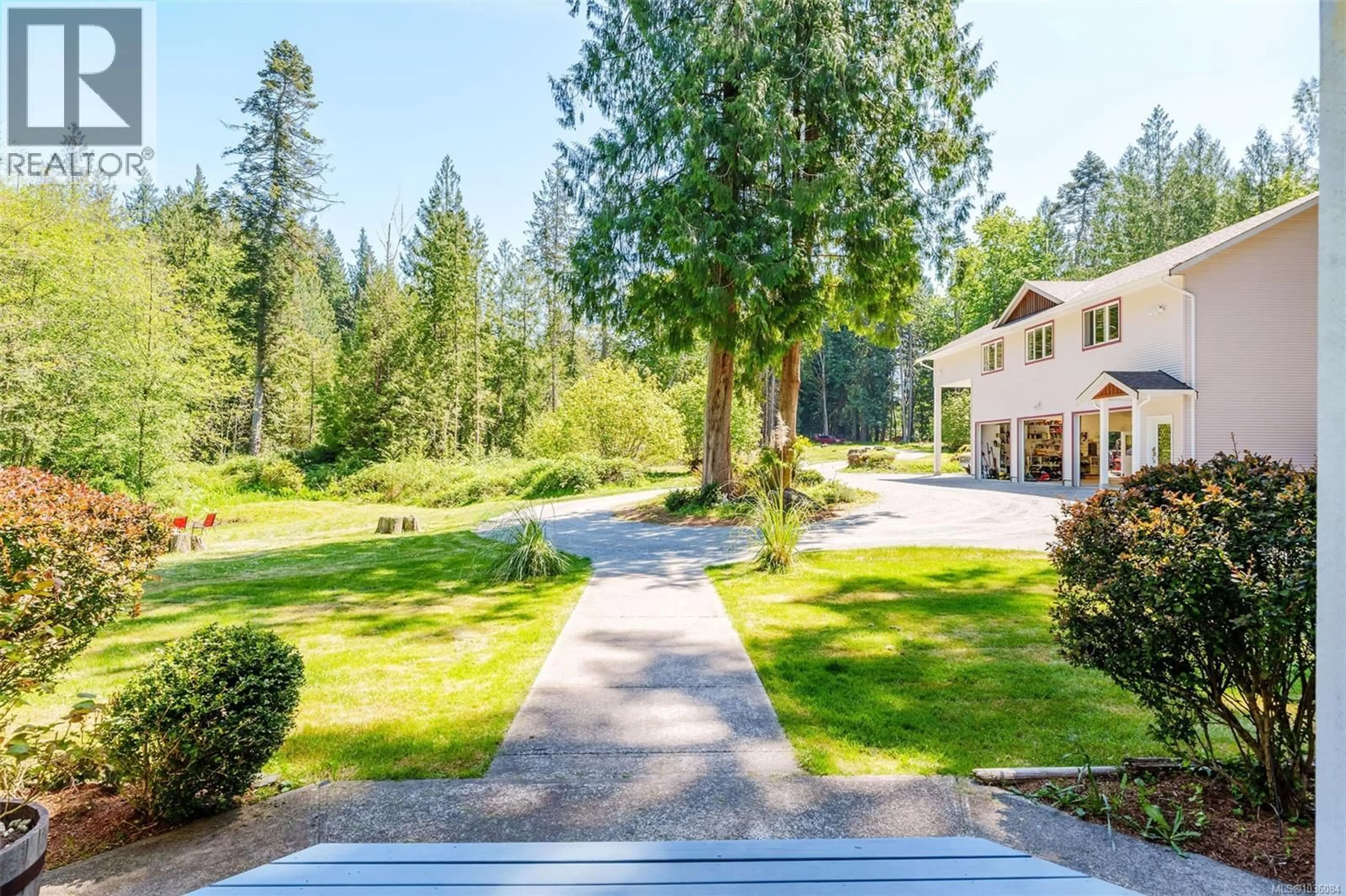 A pic from outside/outdoor area/front of a property/back of a property/a pic from drone, mountain view for 1520 LAZO LANE, Nanaimo British Columbia V9X1M9
