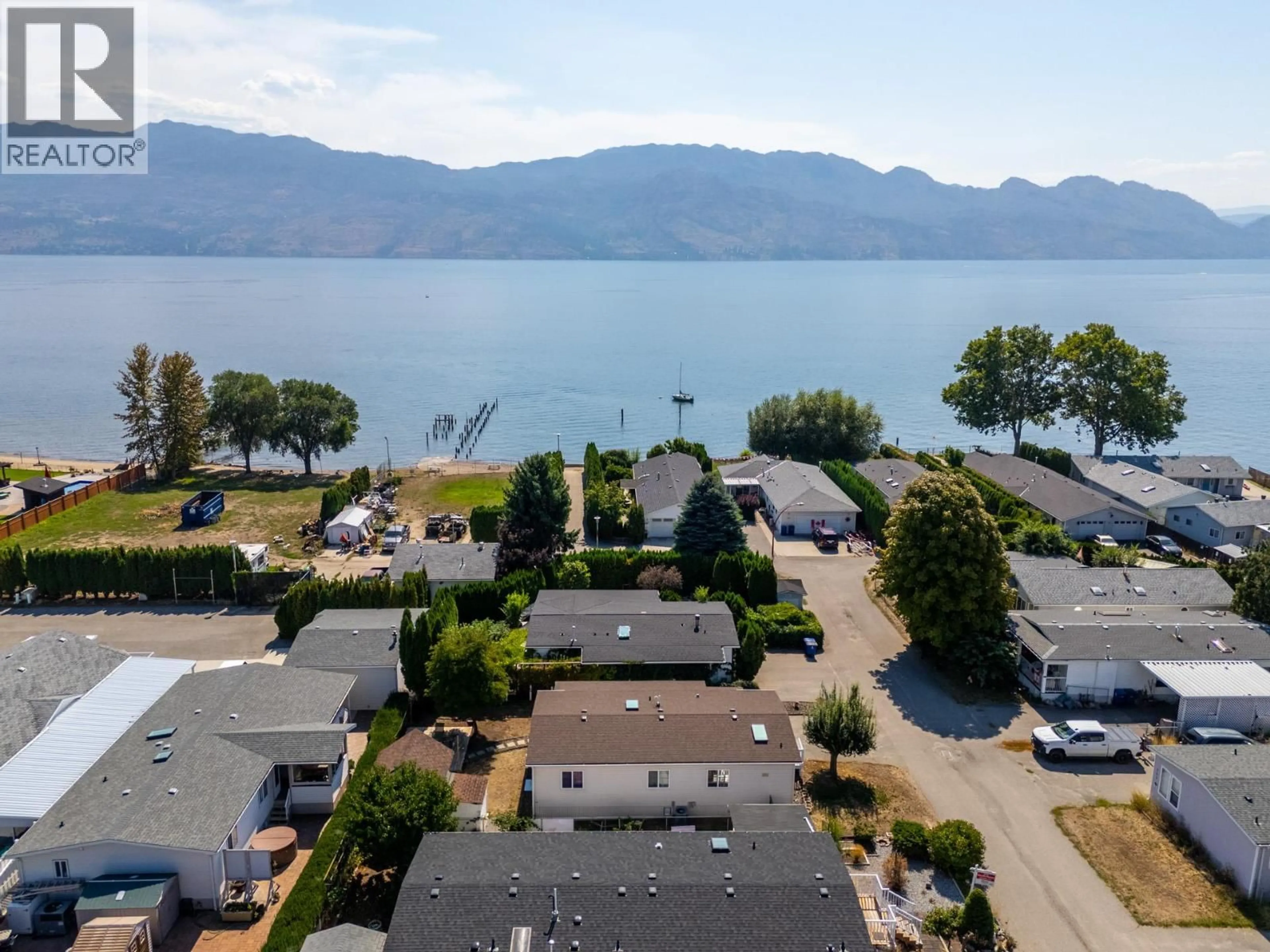 A pic from outside/outdoor area/front of a property/back of a property/a pic from drone, water/lake/river/ocean view for 138 - 2005 BOUCHERIE ROAD, West Kelowna British Columbia V4T1R4