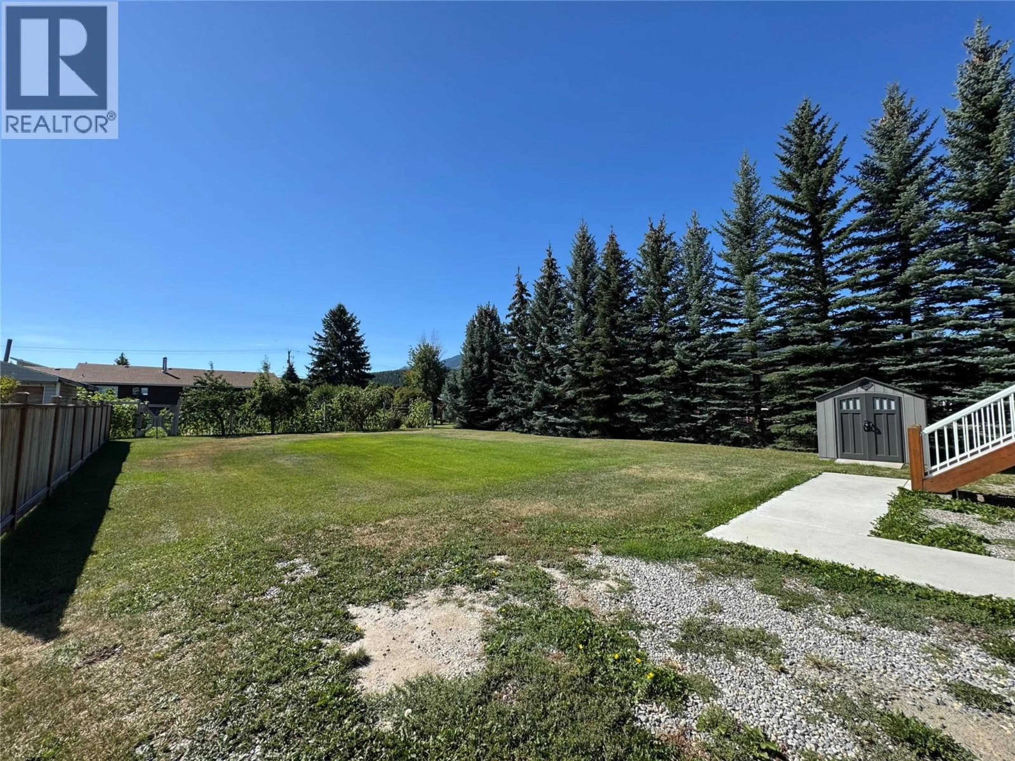 A pic from outside/outdoor area/front of a property/back of a property/a pic from drone, unknown for 4760 WILLOW AVENUE, Canal Flats British Columbia V0B1B0