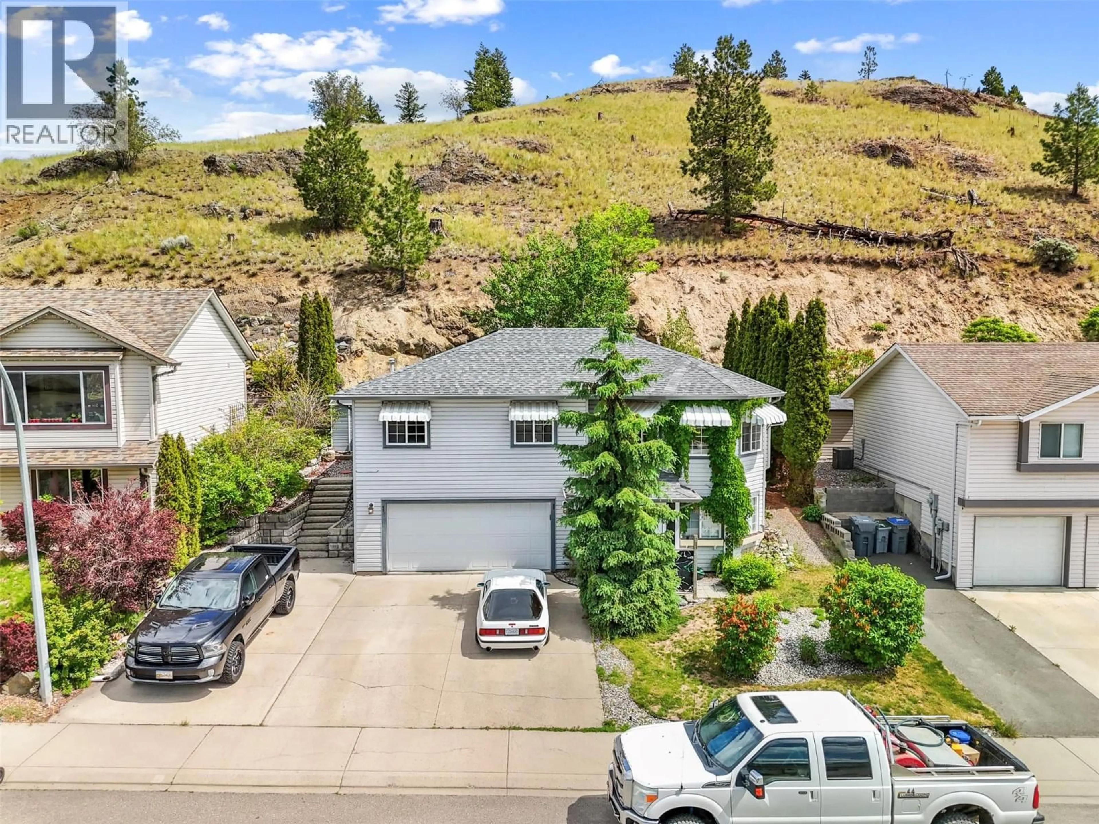 A pic from outside/outdoor area/front of a property/back of a property/a pic from drone, mountain view for 1368 SUNSHINE COURT, Kamloops British Columbia V2E2P9