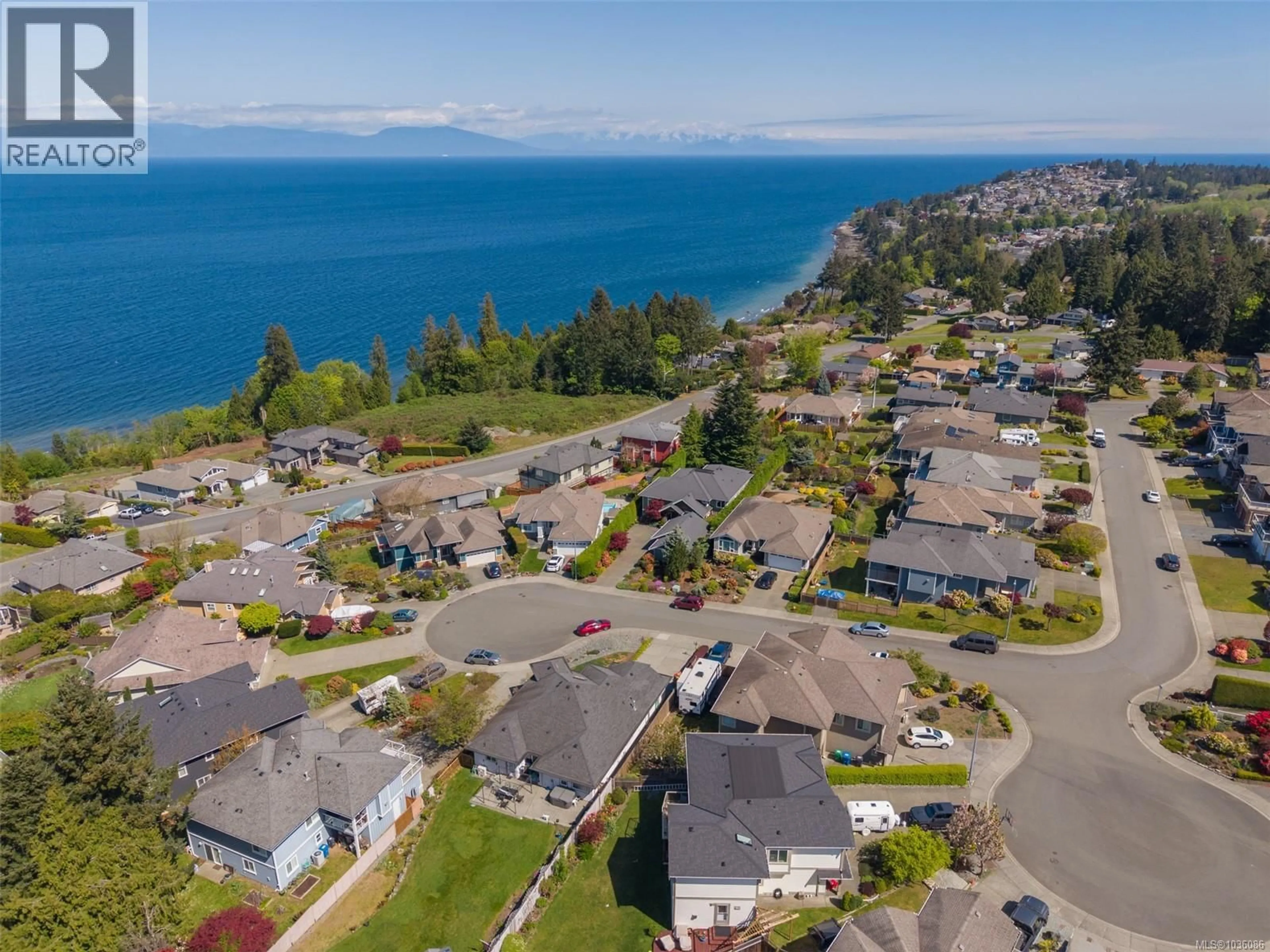 A pic from outside/outdoor area/front of a property/back of a property/a pic from drone, water/lake/river/ocean view for 5676 MUGGIES WAY, Nanaimo British Columbia V9V1W2