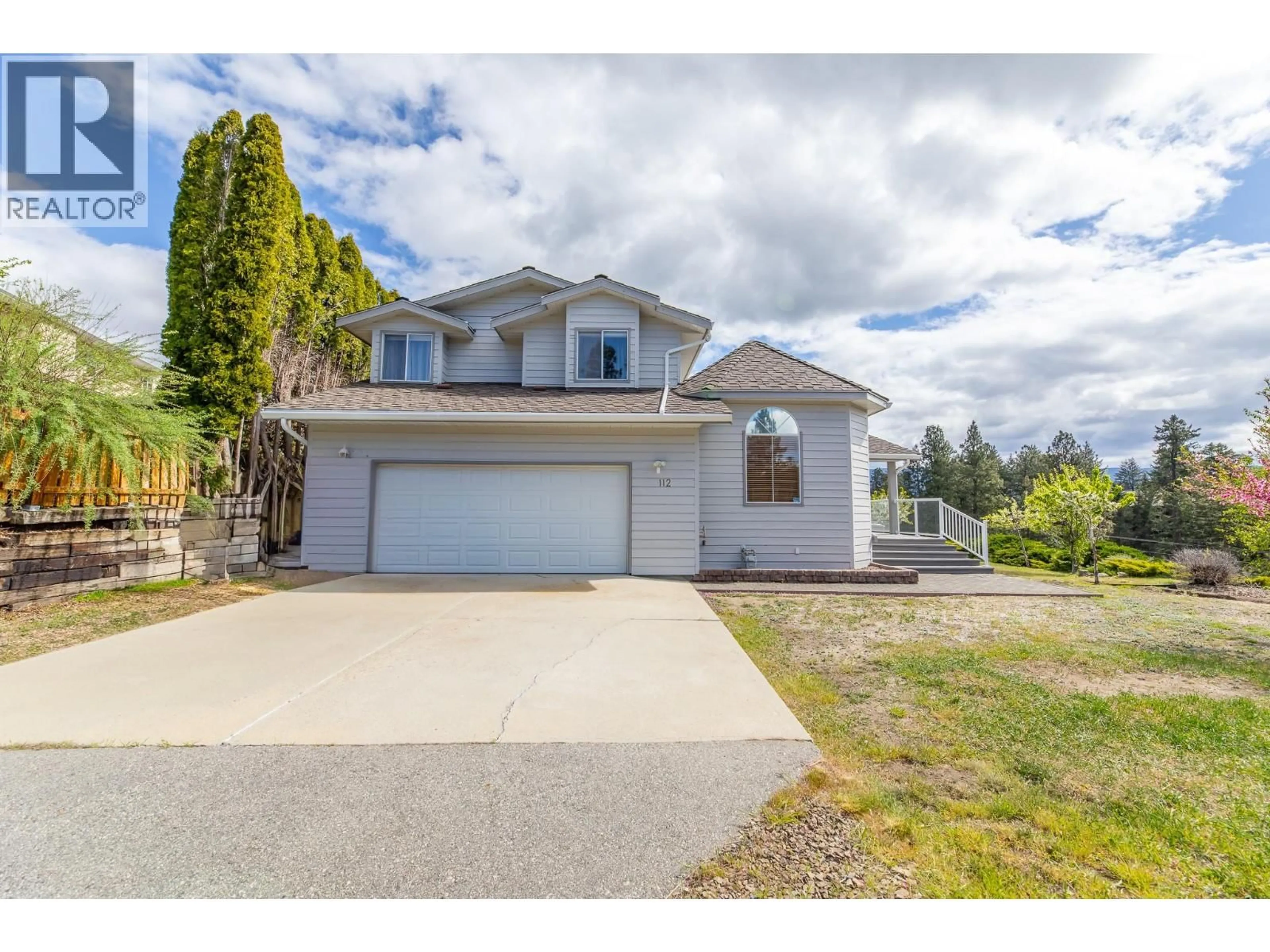 A pic from outside/outdoor area/front of a property/back of a property/a pic from drone, street for 112 SUMAC RIDGE DRIVE, Summerland British Columbia V0H1Z6