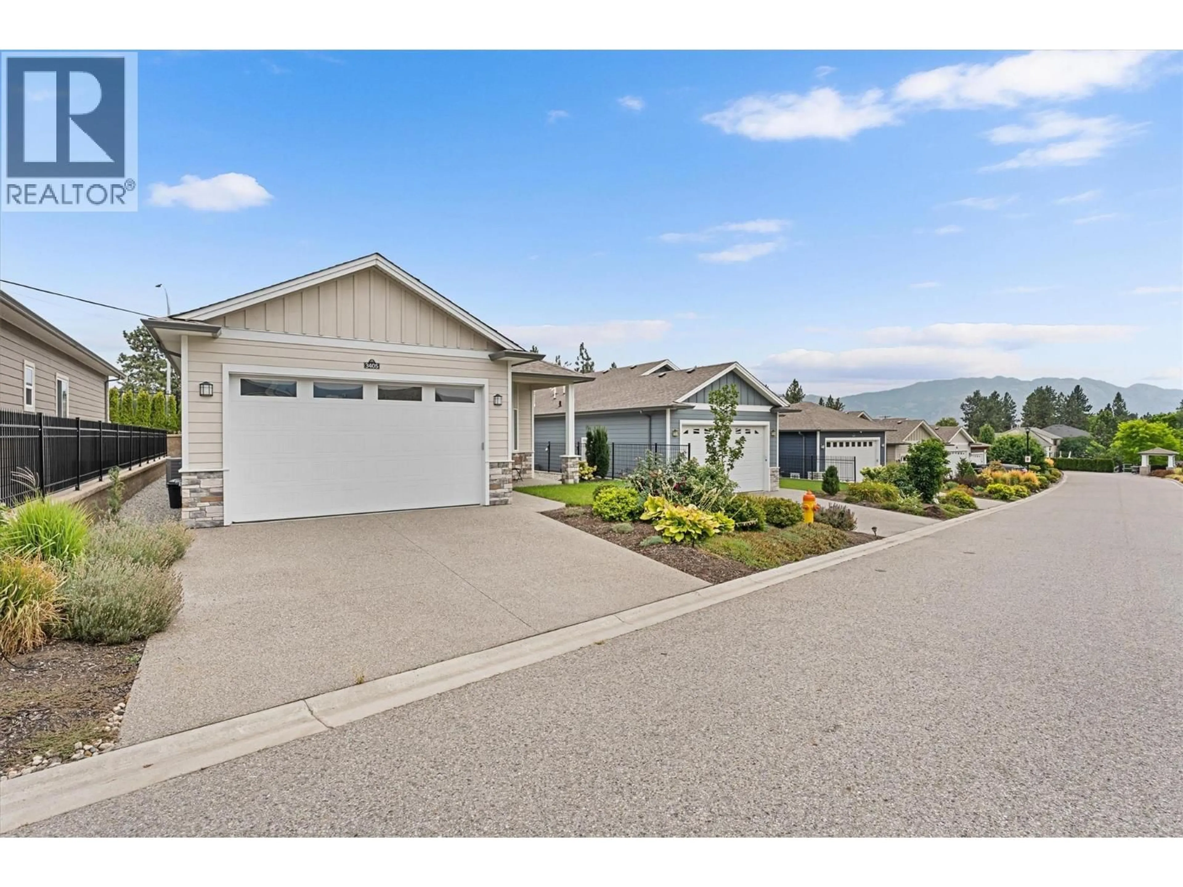 A pic from outside/outdoor area/front of a property/back of a property/a pic from drone, street for 3405 IRONWOOD DRIVE, West Kelowna British Columbia V4T0A9