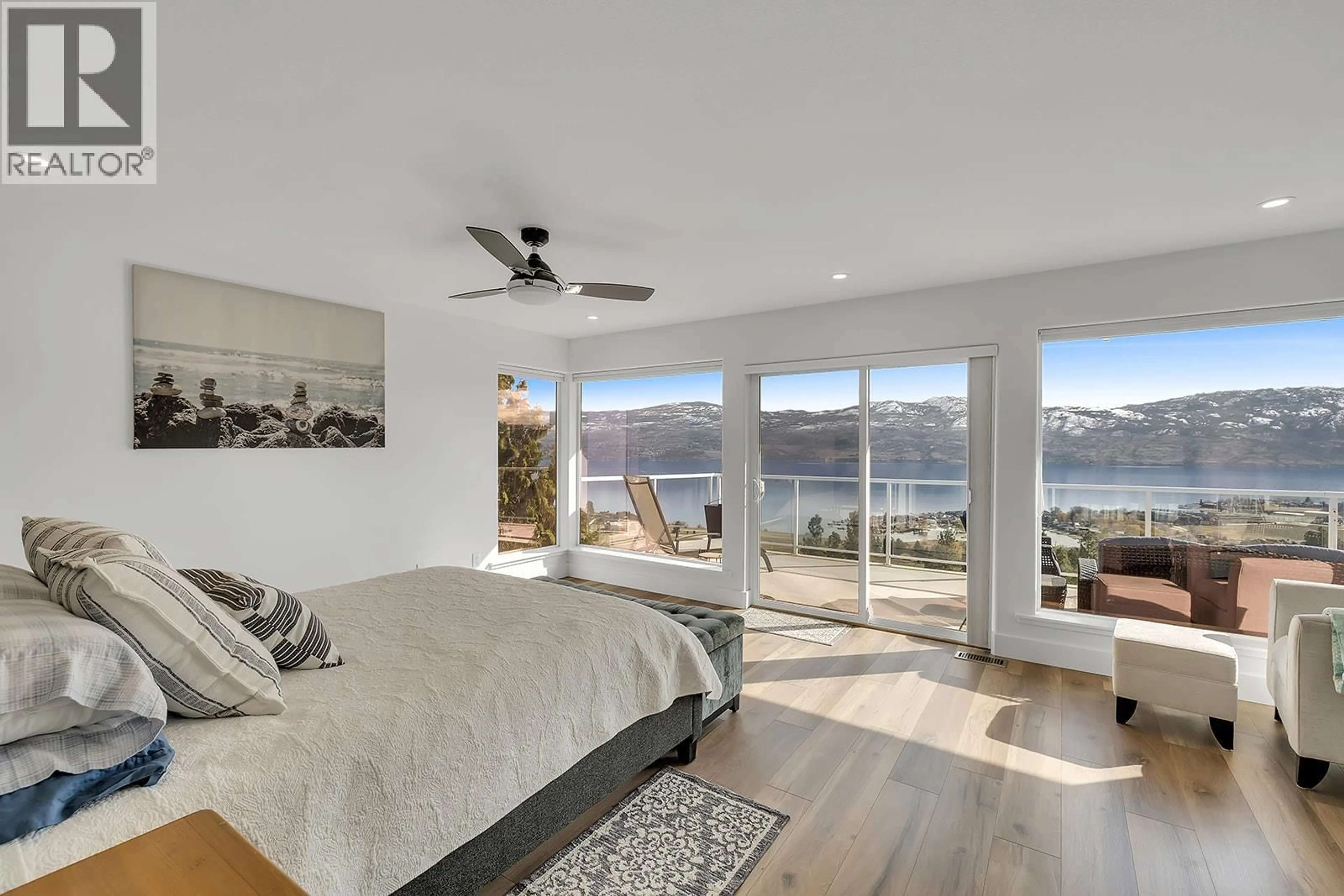 Bedroom with bed, wood/laminate floor for 1405 MENU ROAD, West Kelowna British Columbia V4T2R9
