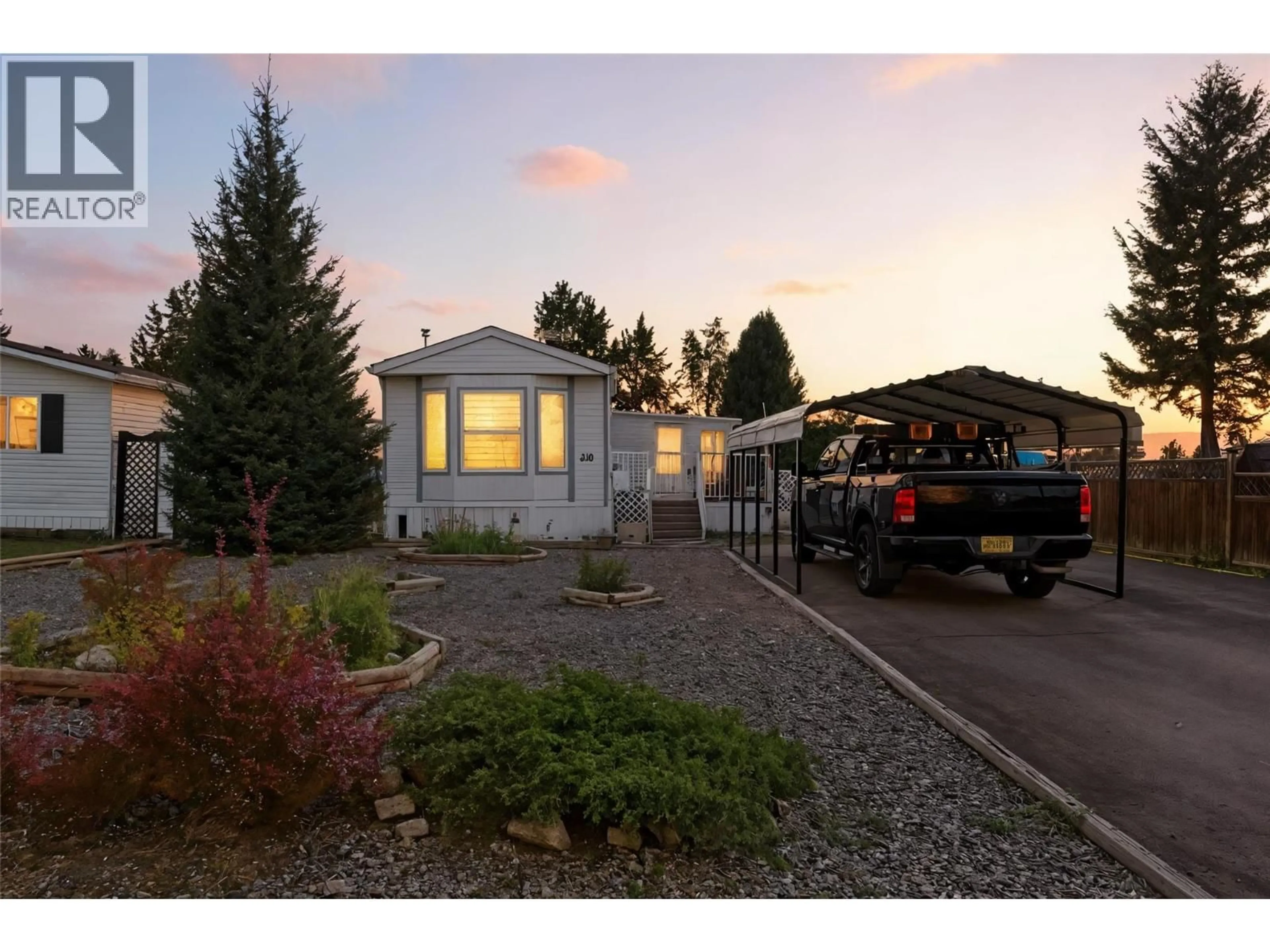 Home with vinyl exterior material, street for 310 AMETHYST COURT, Logan Lake British Columbia V0K1W0