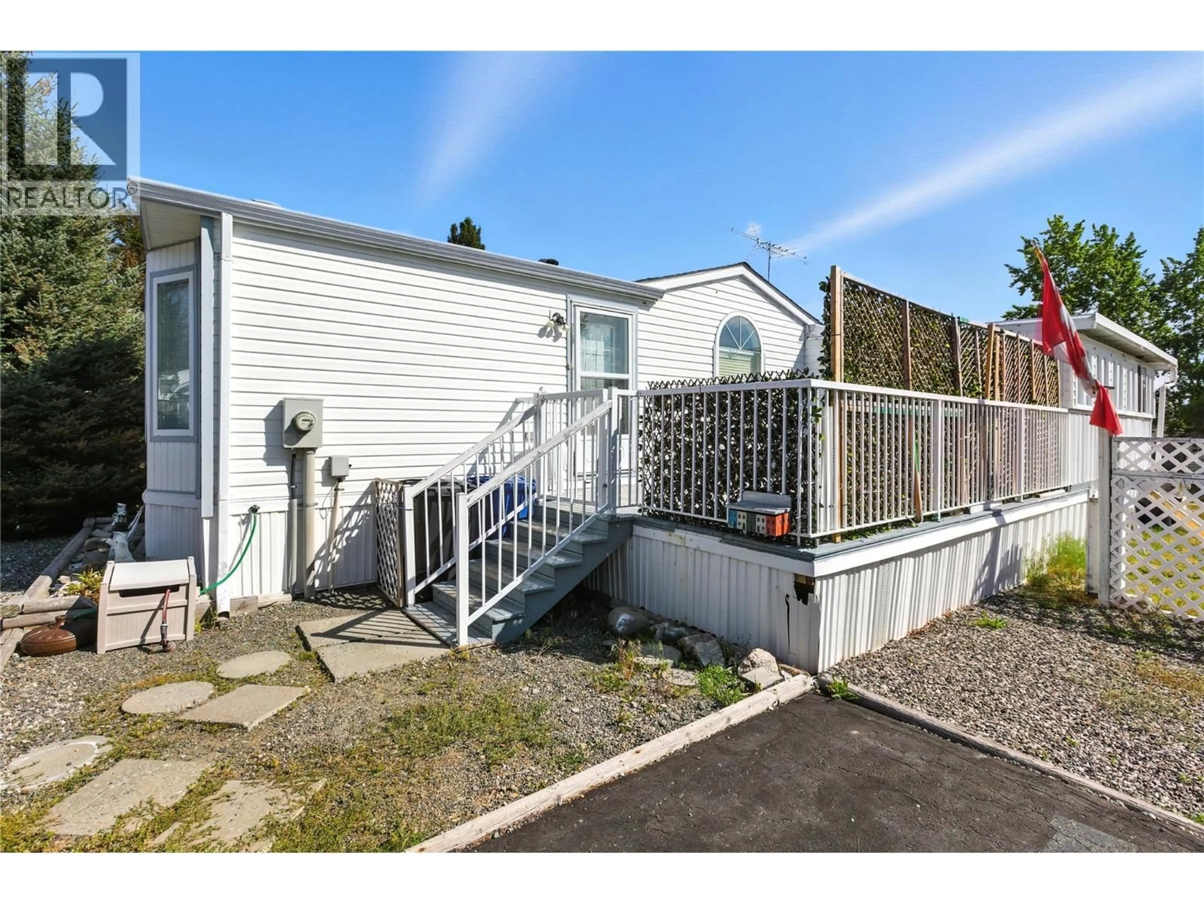 A pic from outside/outdoor area/front of a property/back of a property/a pic from drone, street for 310 AMETHYST COURT, Logan Lake British Columbia V0K1W0