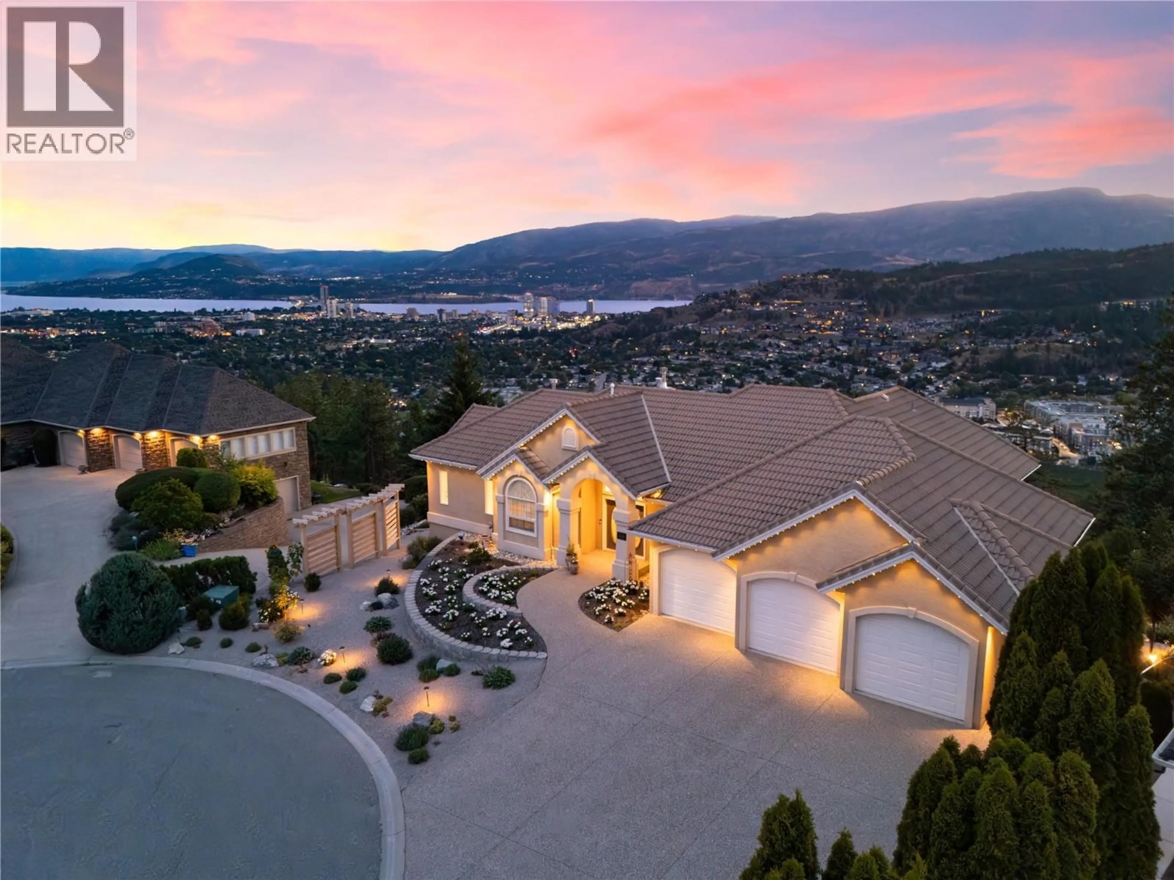 A pic from outside/outdoor area/front of a property/back of a property/a pic from drone, mountain view for 2150 BRECKENRIDGE COURT, Kelowna British Columbia V1V1W2
