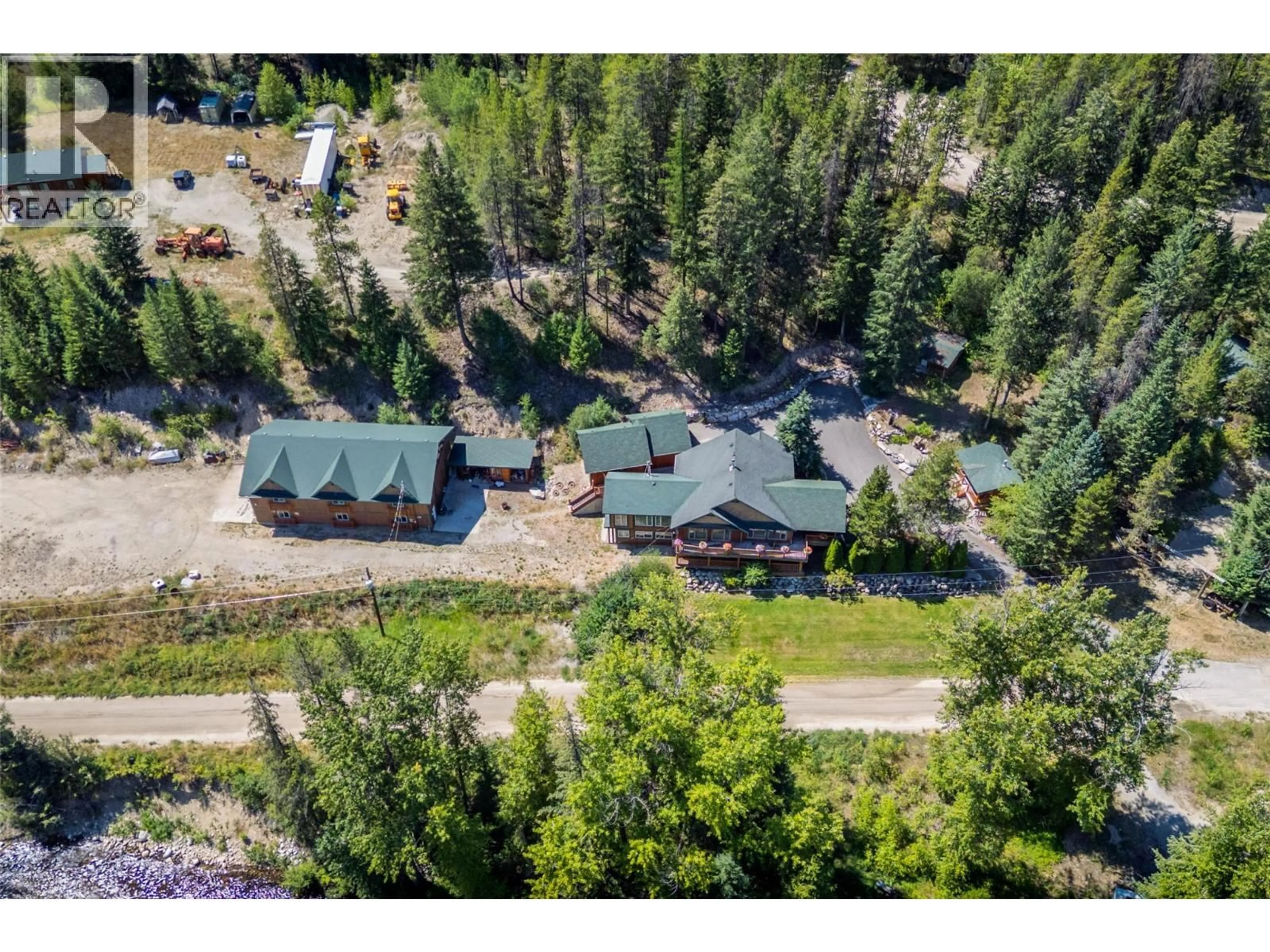 A pic from outside/outdoor area/front of a property/back of a property/a pic from drone, mountain view for 95 & 105 DALE AVENUE, Carmi British Columbia V0H1A0