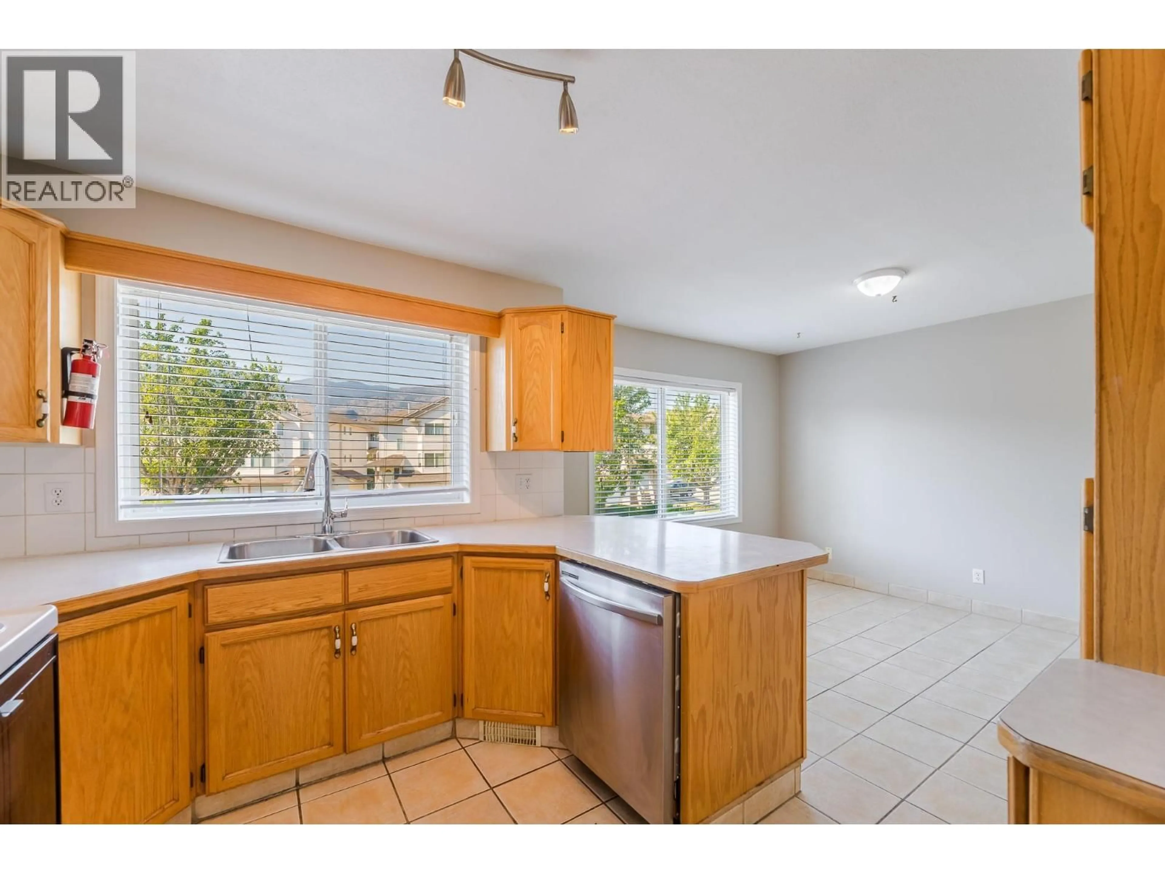 Standard kitchen, ceramic/tile floor for 160 - 3153 PARIS STREET, Penticton British Columbia V2A8P1