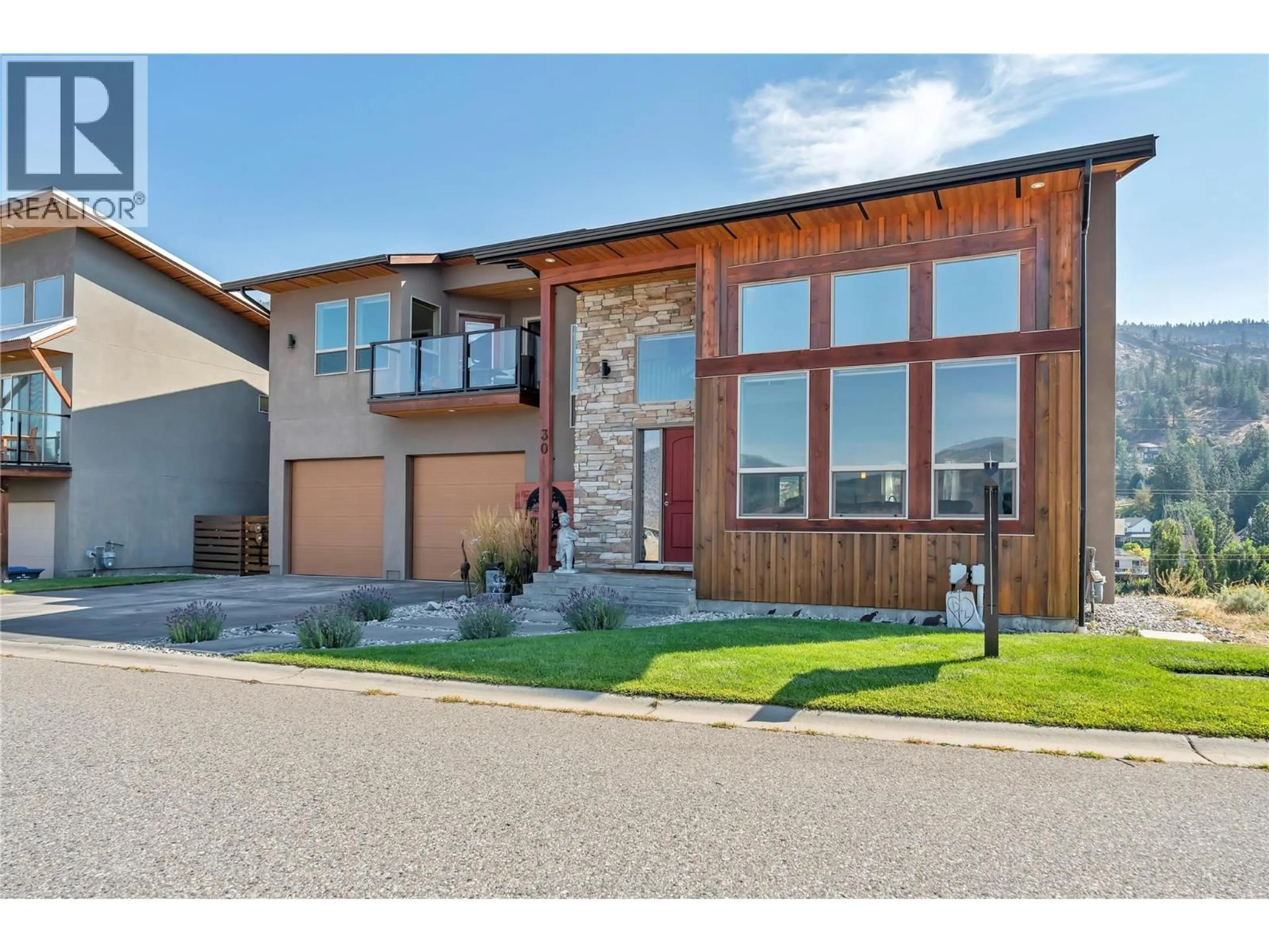 Home with brick exterior material, street for 30 - 125 CABERNET DRIVE, Okanagan Falls British Columbia V0H1R3