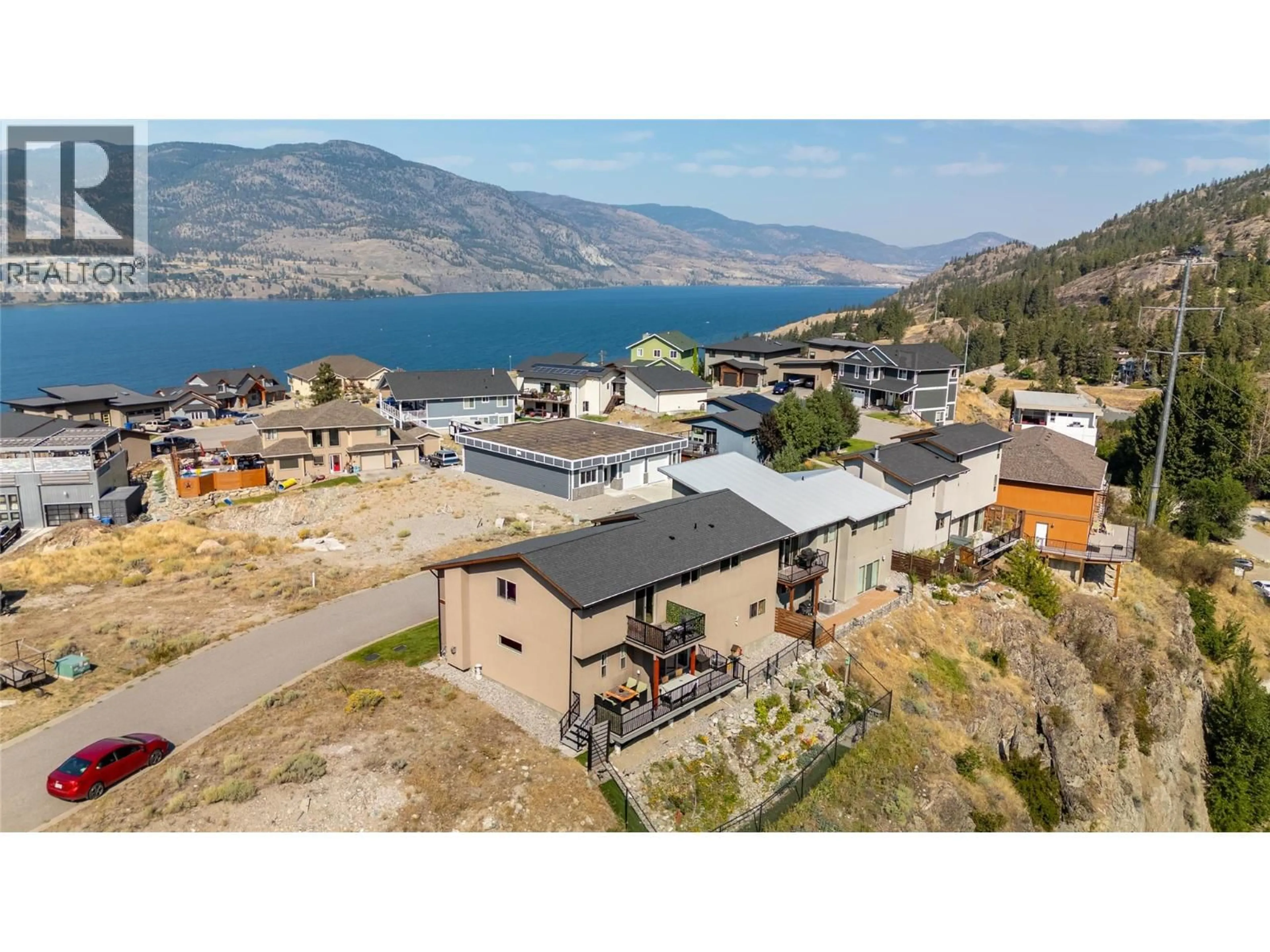 A pic from outside/outdoor area/front of a property/back of a property/a pic from drone, water/lake/river/ocean view for 30 - 125 CABERNET DRIVE, Okanagan Falls British Columbia V0H1R3