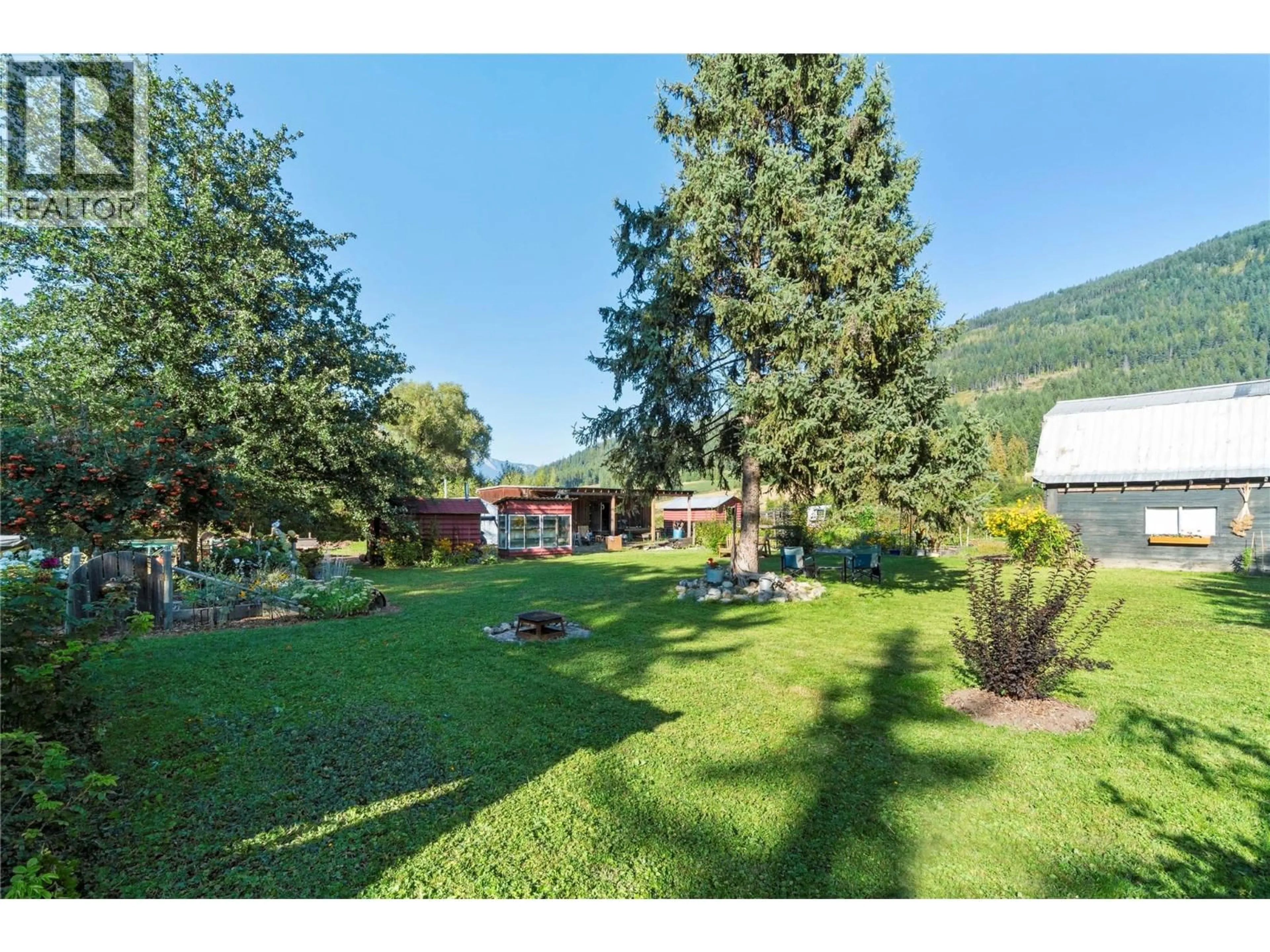 A pic from outside/outdoor area/front of a property/back of a property/a pic from drone, mountain view for 3590 50 STREET NORTHEAST, Salmon Arm British Columbia V1E1Y5
