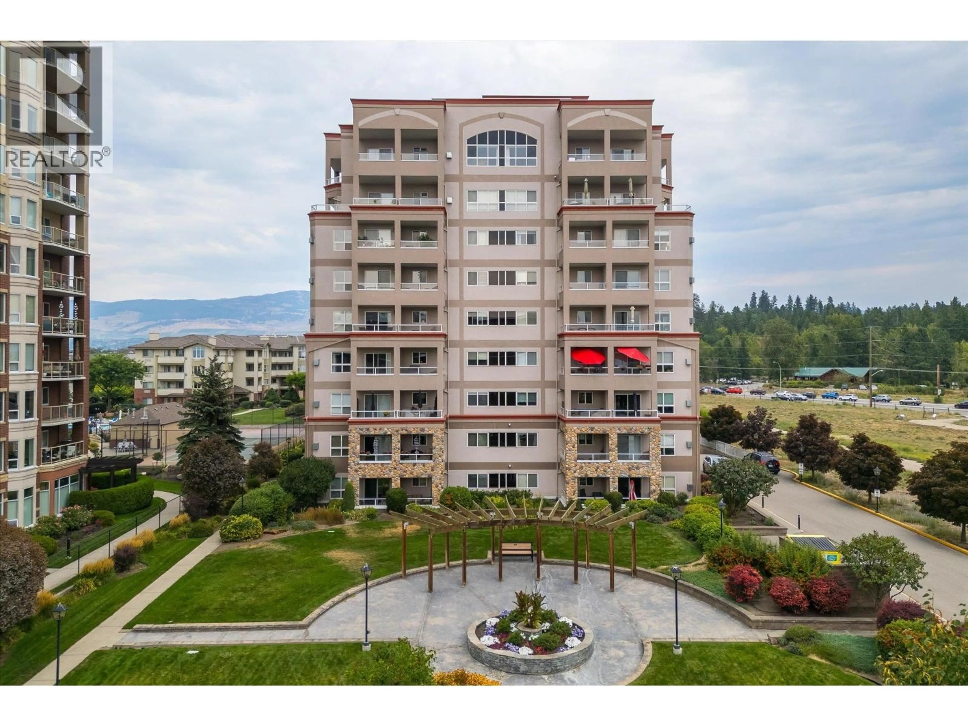 A pic from outside/outdoor area/front of a property/back of a property/a pic from drone, mountain view for 601 - 1967 UNDERHILL STREET, Kelowna British Columbia V1X8C9