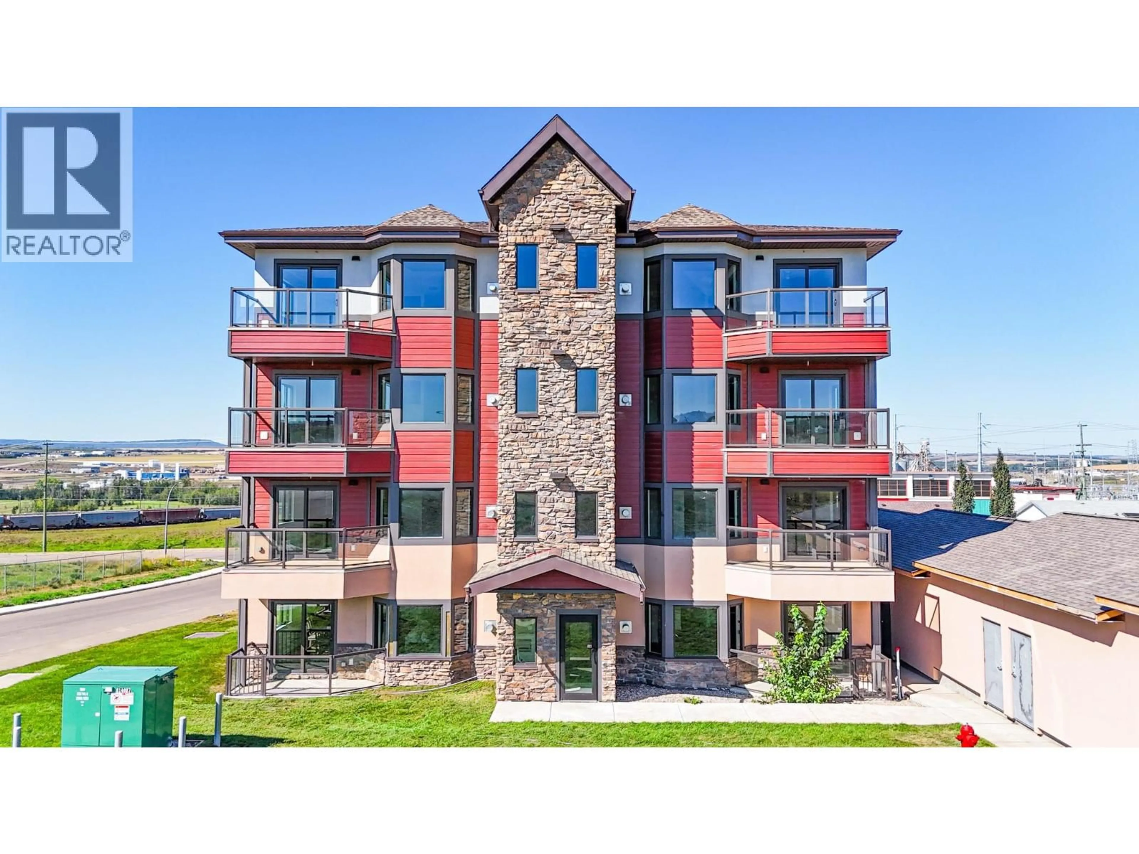 Home with brick exterior material, building for 1202 - 2032 86 AVENUE, Dawson Creek British Columbia V1G0G7